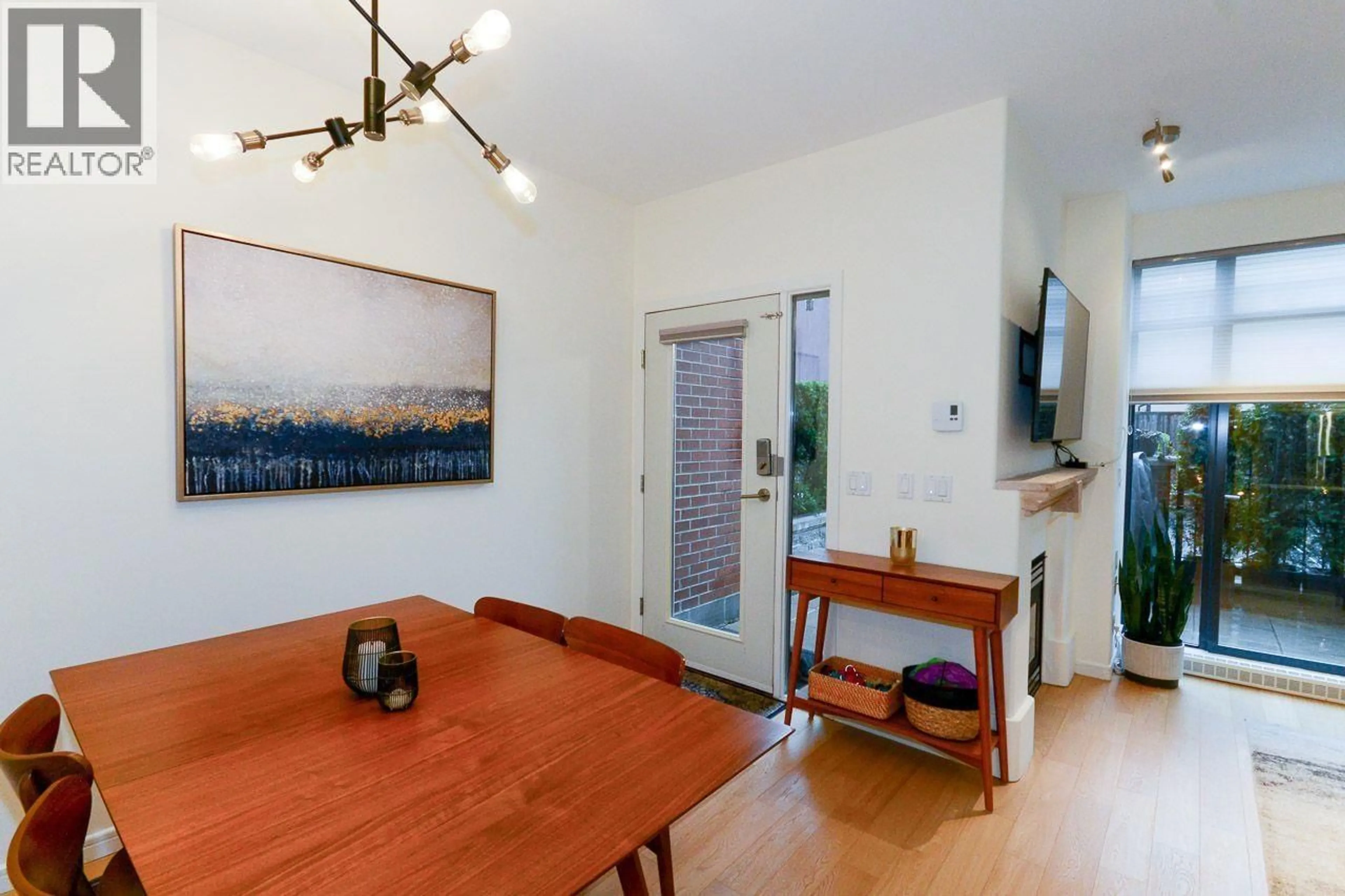 Dining room, wood/laminate floor for 104 - 2688 VINE STREET, Vancouver British Columbia V6K4T6