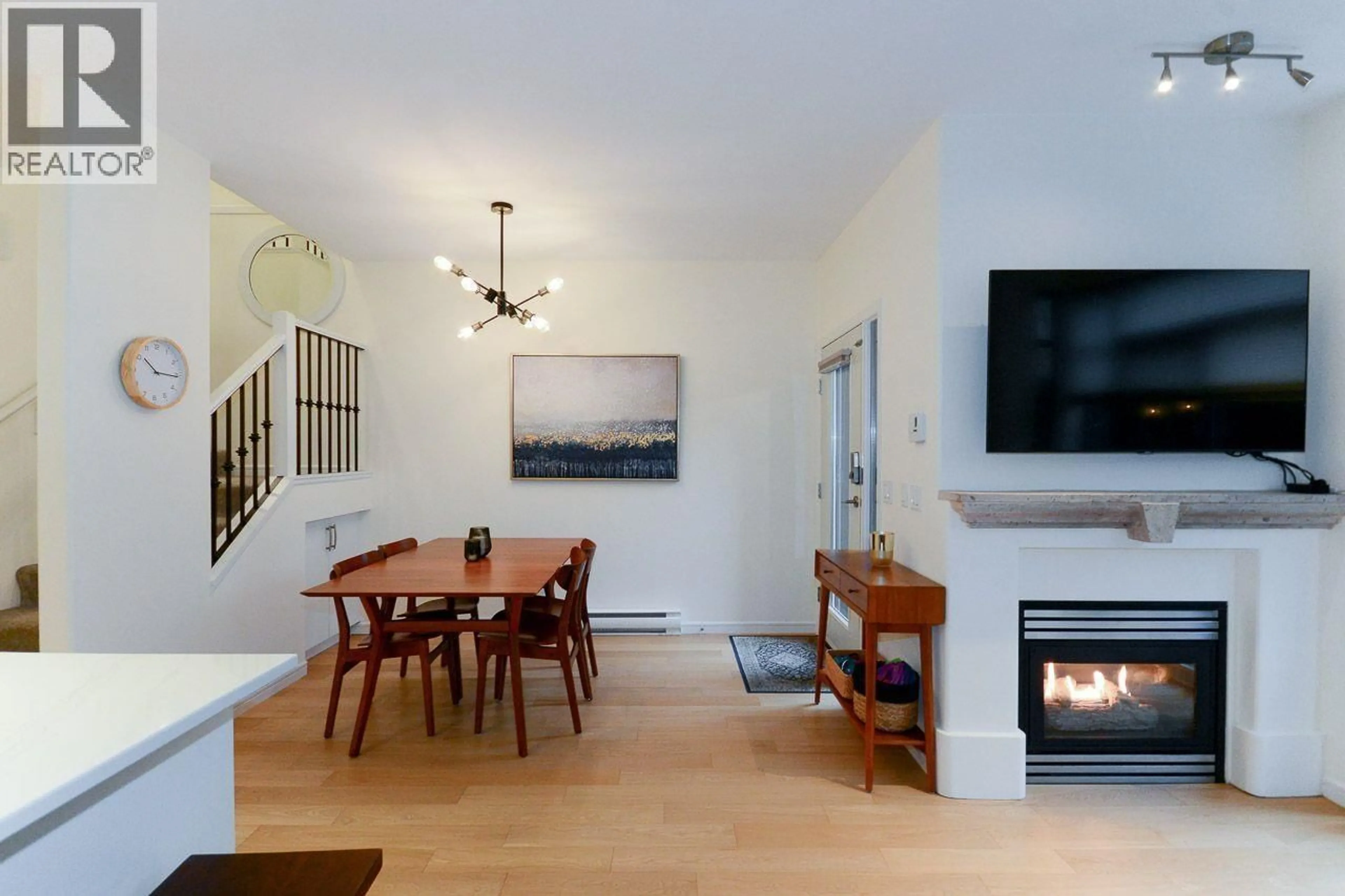 Living room with furniture, wood/laminate floor for 104 - 2688 VINE STREET, Vancouver British Columbia V6K4T6