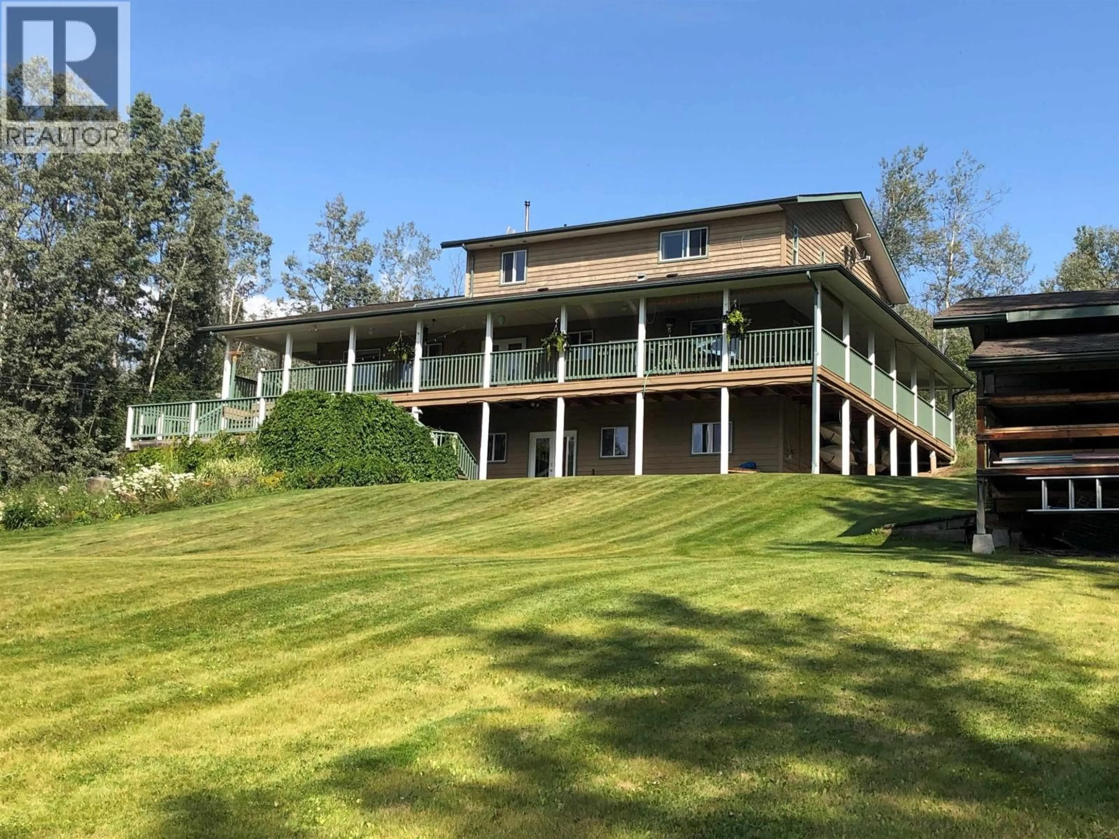 A pic from outside/outdoor area/front of a property/back of a property/a pic from drone, unknown for 1141 HIGHLAND ROAD, Smithers British Columbia V0J2N6