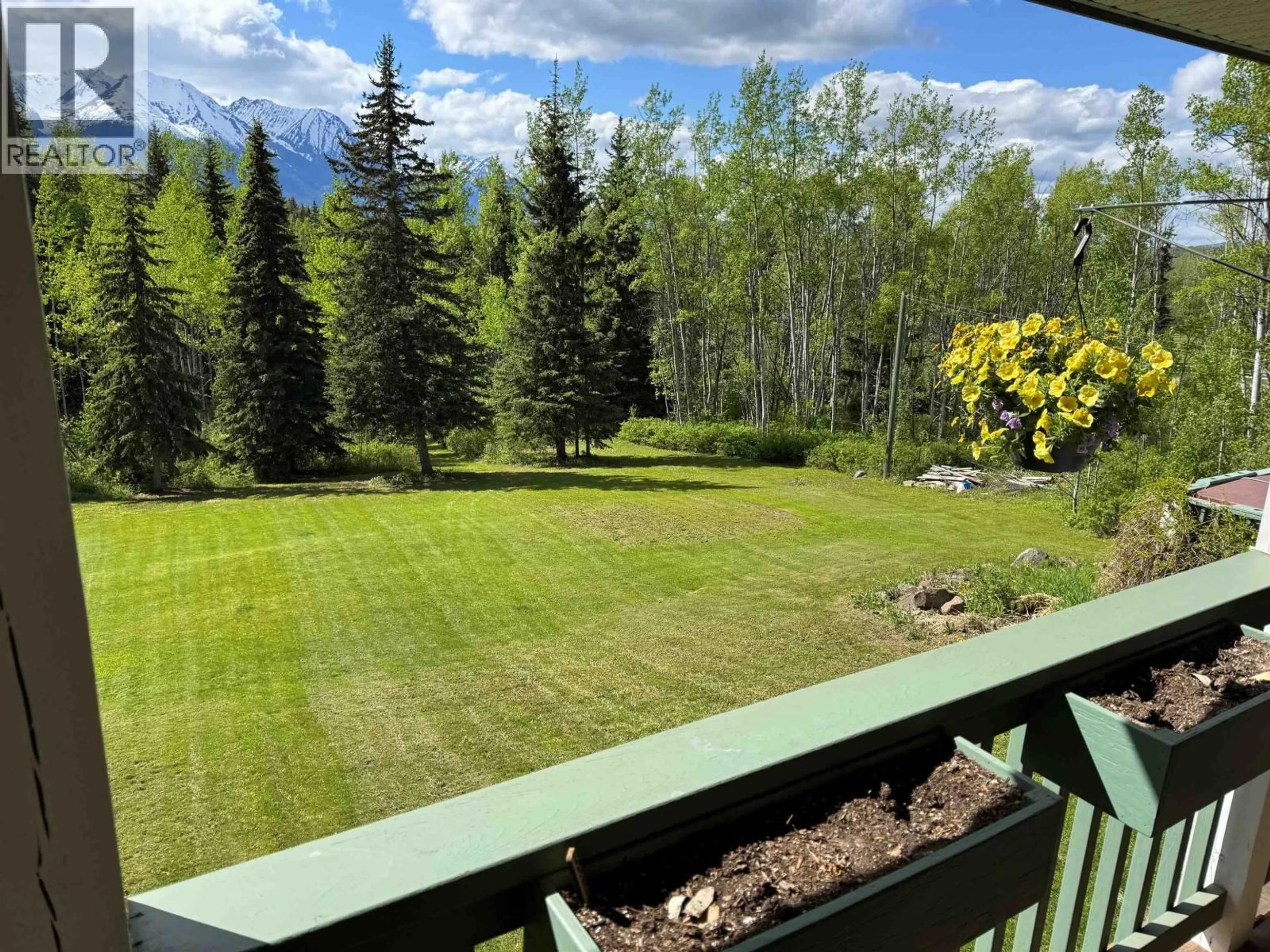 A pic from outside/outdoor area/front of a property/back of a property/a pic from drone, forest/trees view for 1141 HIGHLAND ROAD, Smithers British Columbia V0J2N6