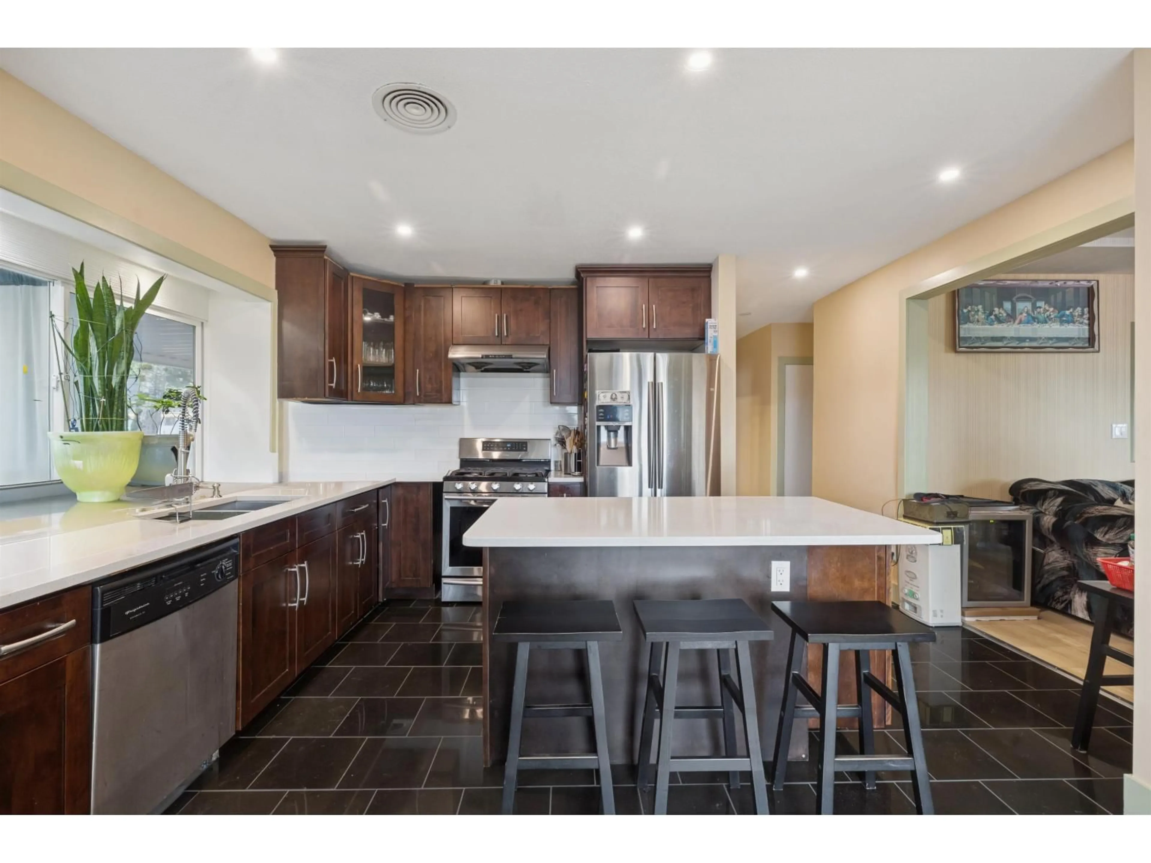 Open concept kitchen, ceramic/tile floor for 16388 88 AVENUE, Surrey British Columbia V4N1B6