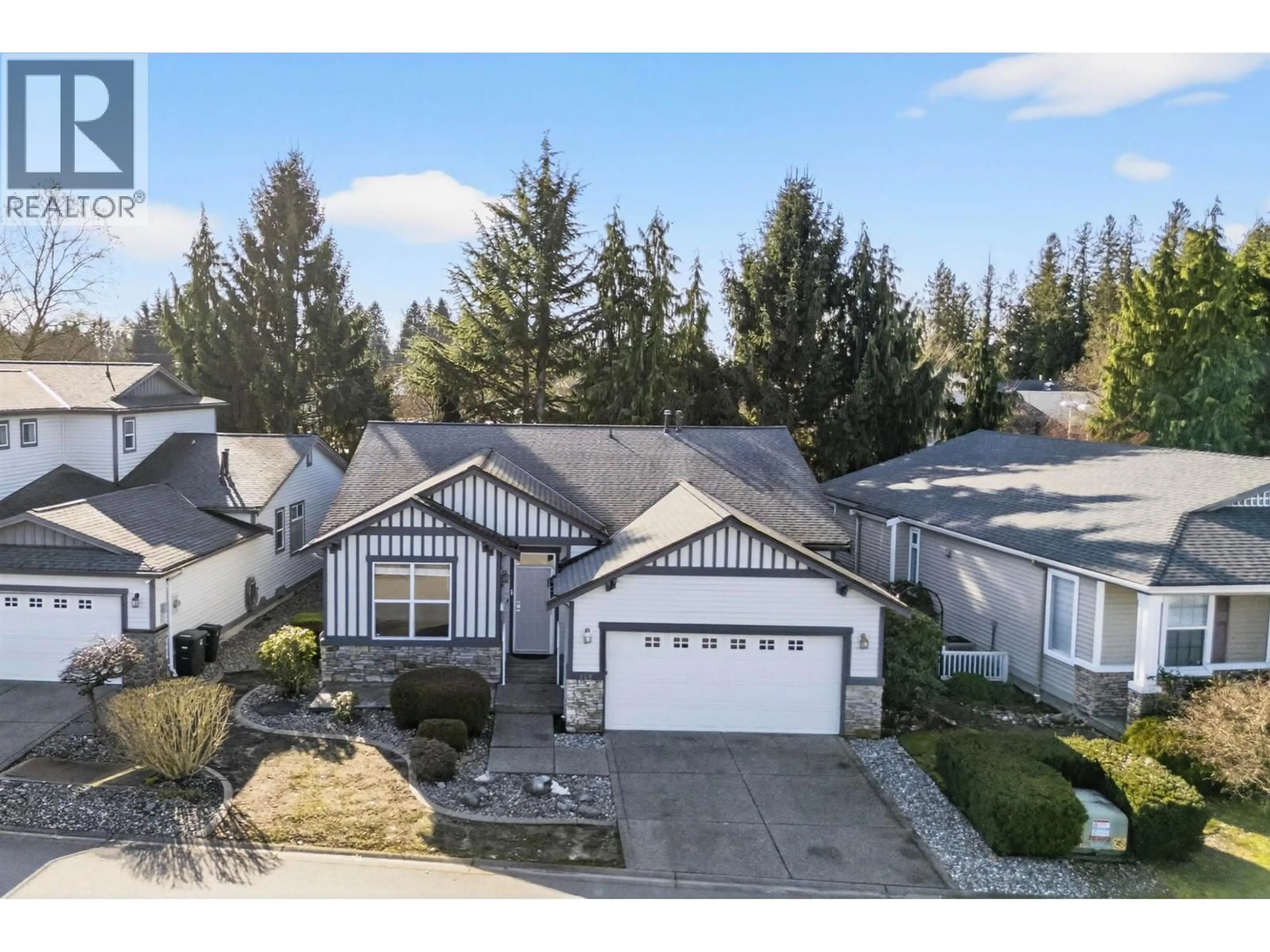 A pic from outside/outdoor area/front of a property/back of a property/a pic from drone, street for 148 - 19639 MEADOW GARDENS WAY, Pitt Meadows British Columbia V3Y2T5