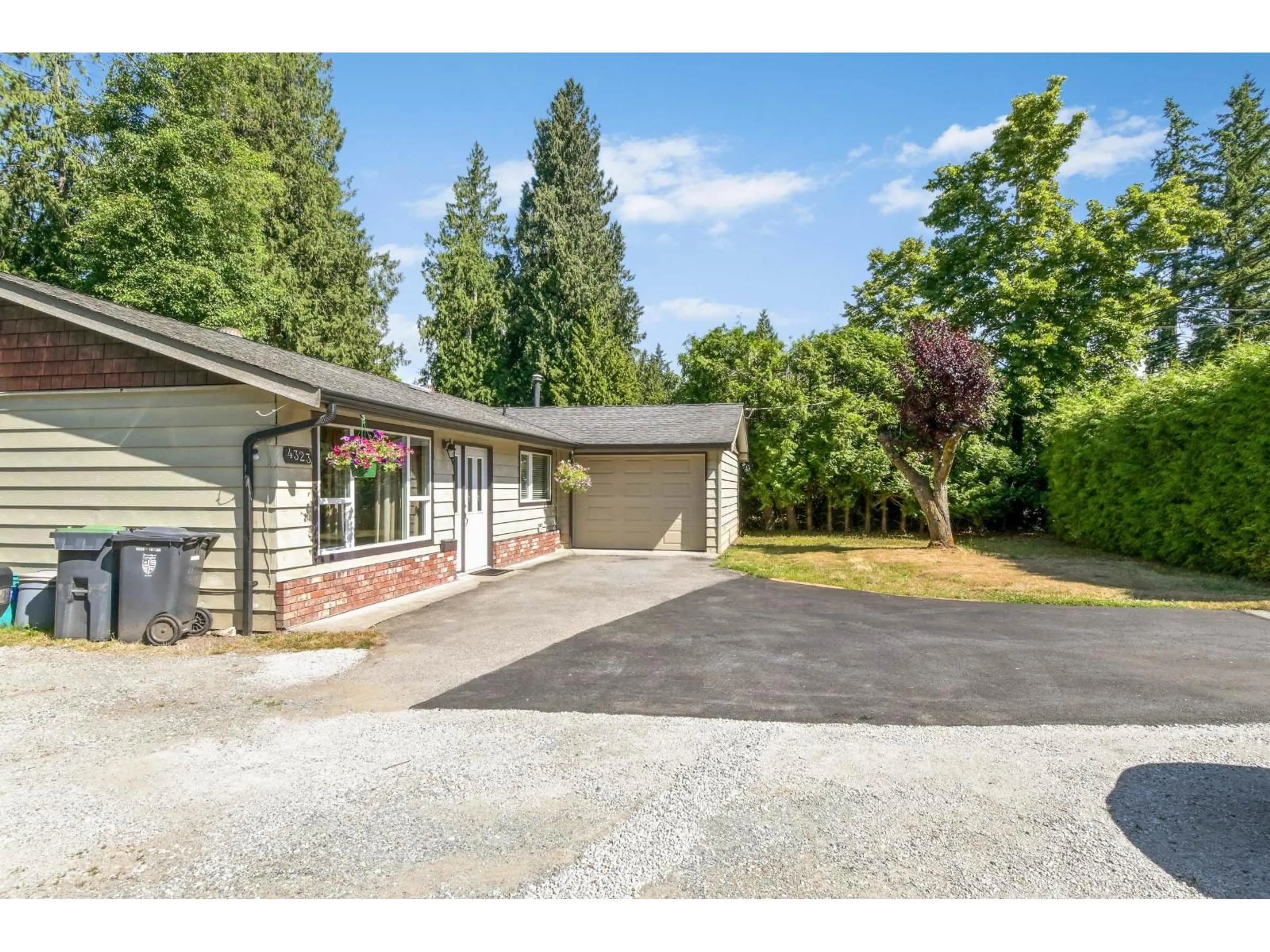 A pic from outside/outdoor area/front of a property/back of a property/a pic from drone, street for 4323 200 STREET, Langley British Columbia V3A1L2