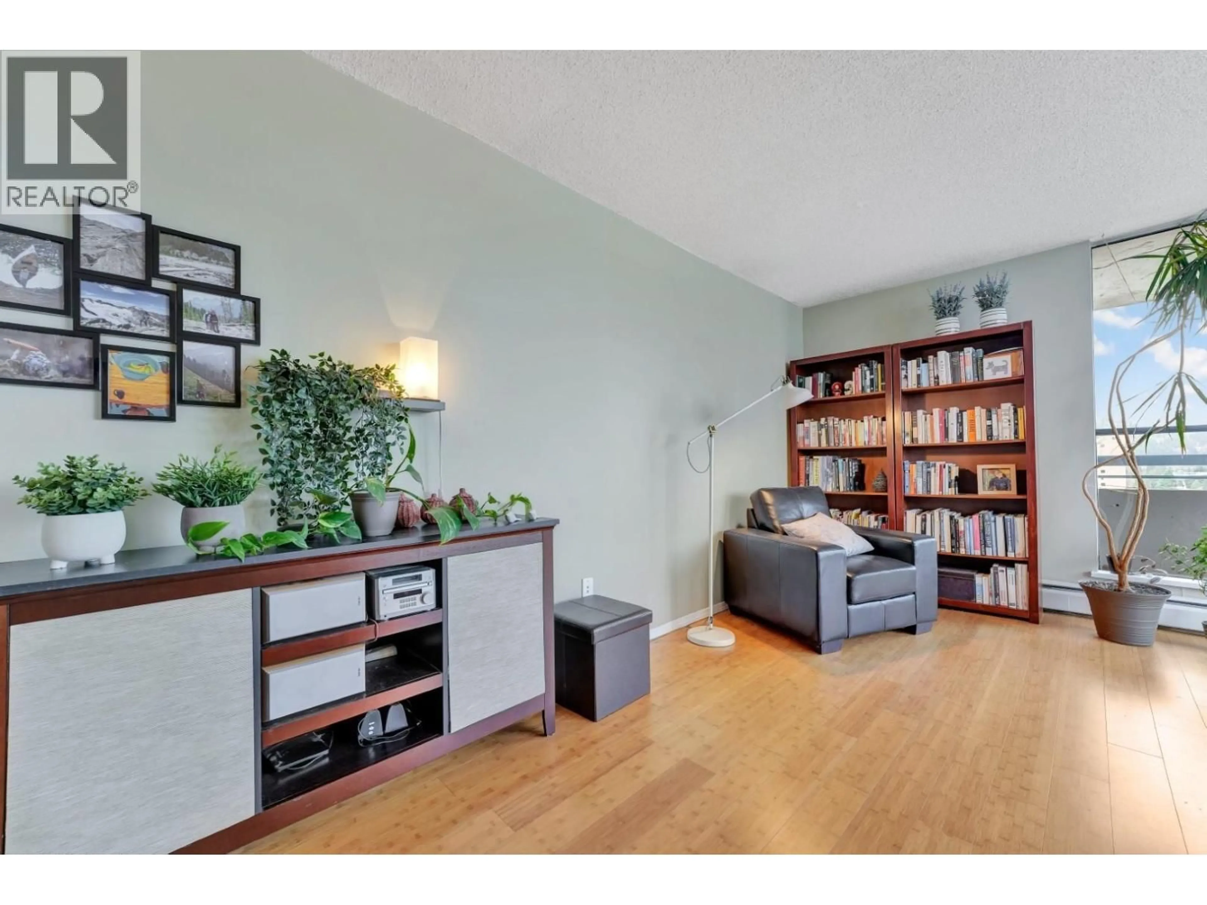 Living room with furniture, wood/laminate floor for 2206 - 3755 BARTLETT COURT, Burnaby British Columbia V3J7G7