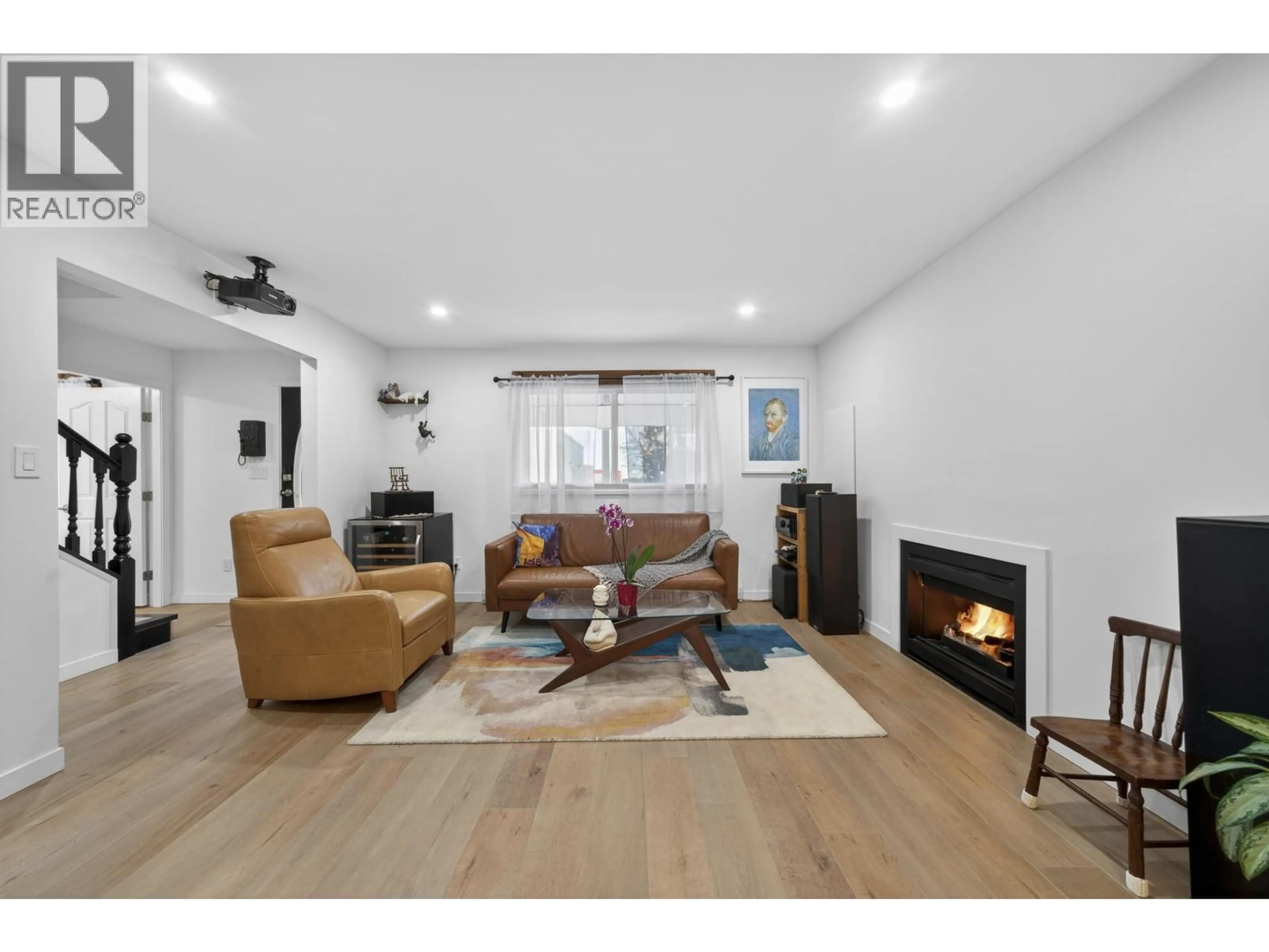 Living room with furniture, wood/laminate floor for 2005 LONDON STREET, New Westminster British Columbia V3M3E6