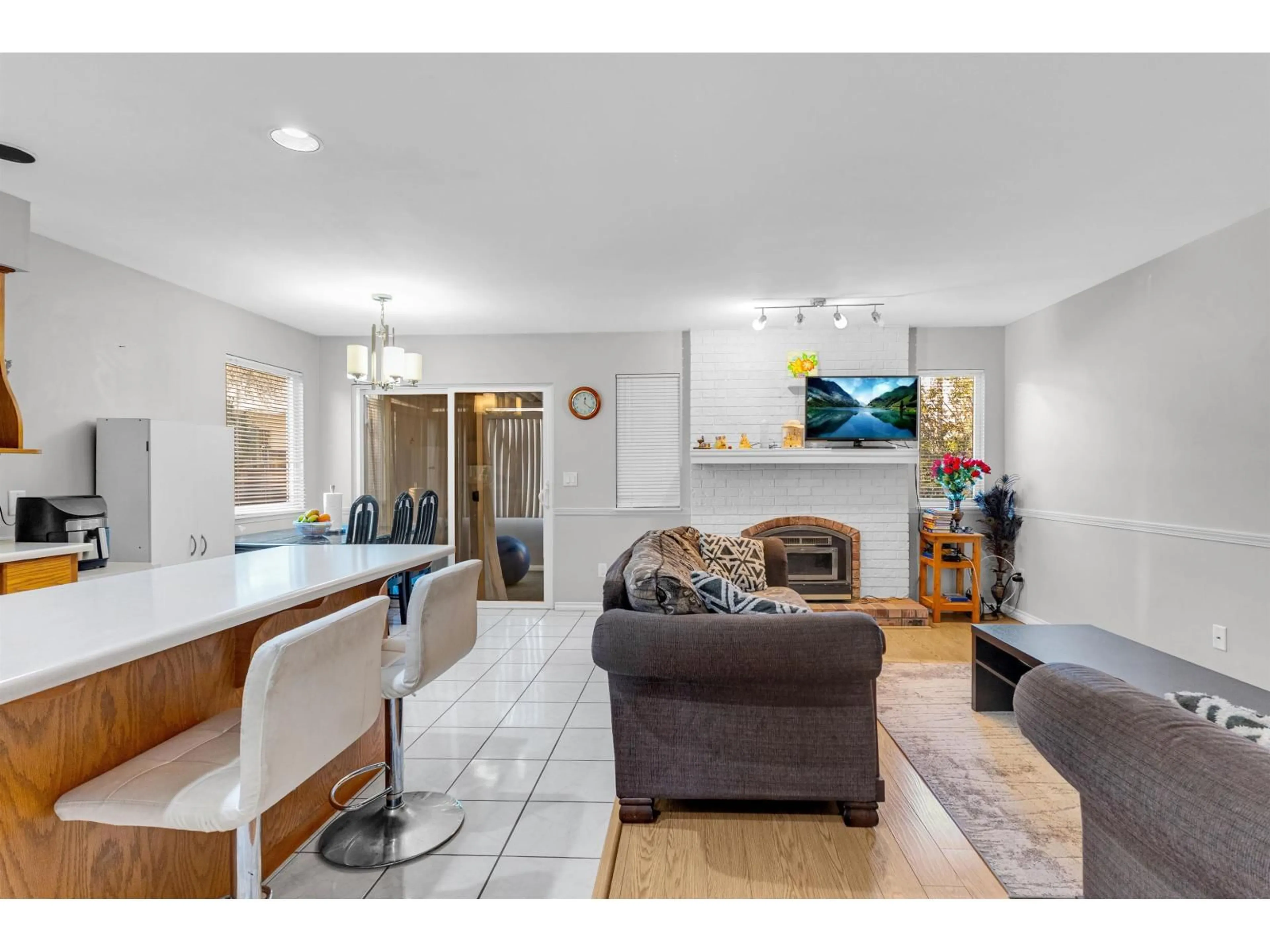 Living room with furniture, ceramic/tile floor for 12905 65 AVENUE, Surrey British Columbia V3W9H4