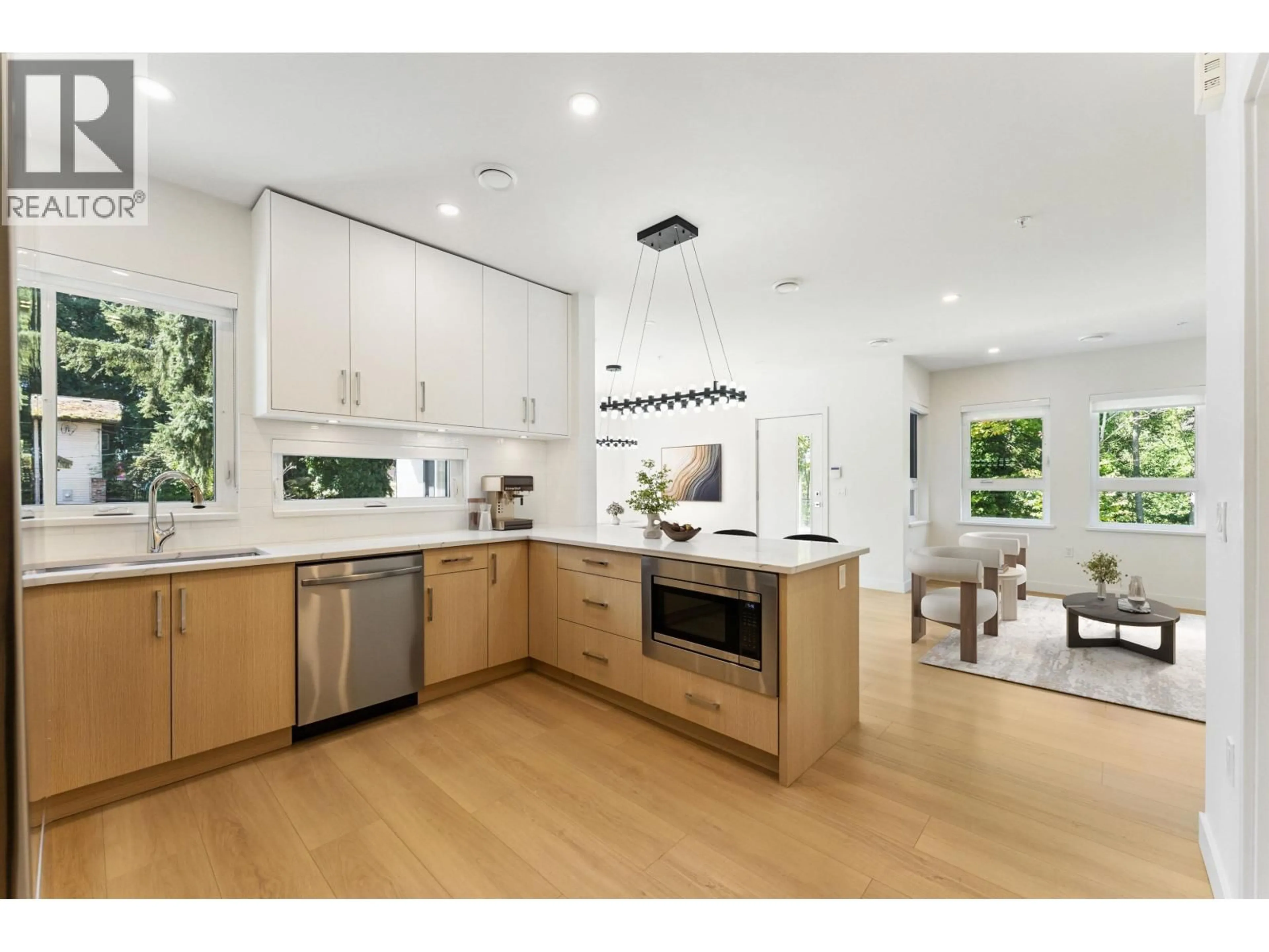 Open concept kitchen, wood/laminate floor for 844 ST. DENIS AVENUE, North Vancouver British Columbia V7J2G4