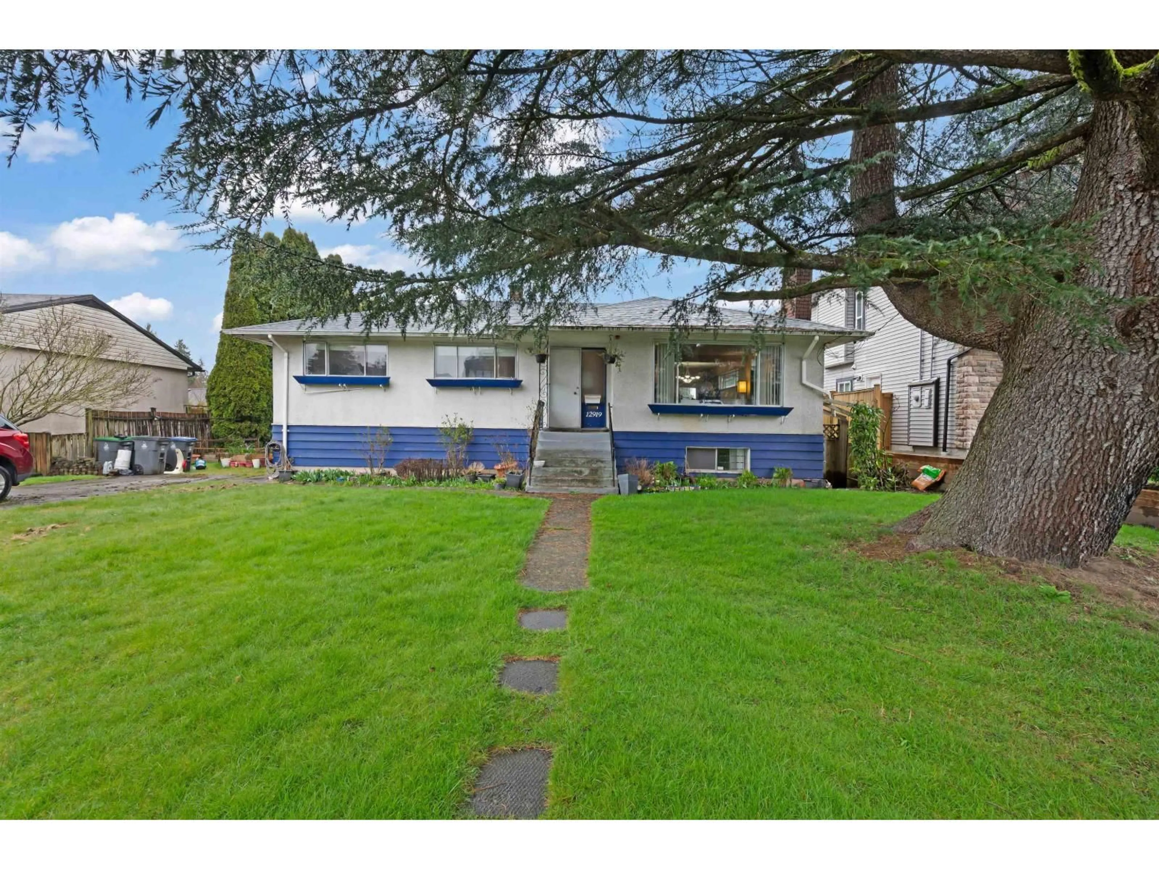A pic from outside/outdoor area/front of a property/back of a property/a pic from drone, street for 12919 98A AVENUE, Surrey British Columbia V3T1C3