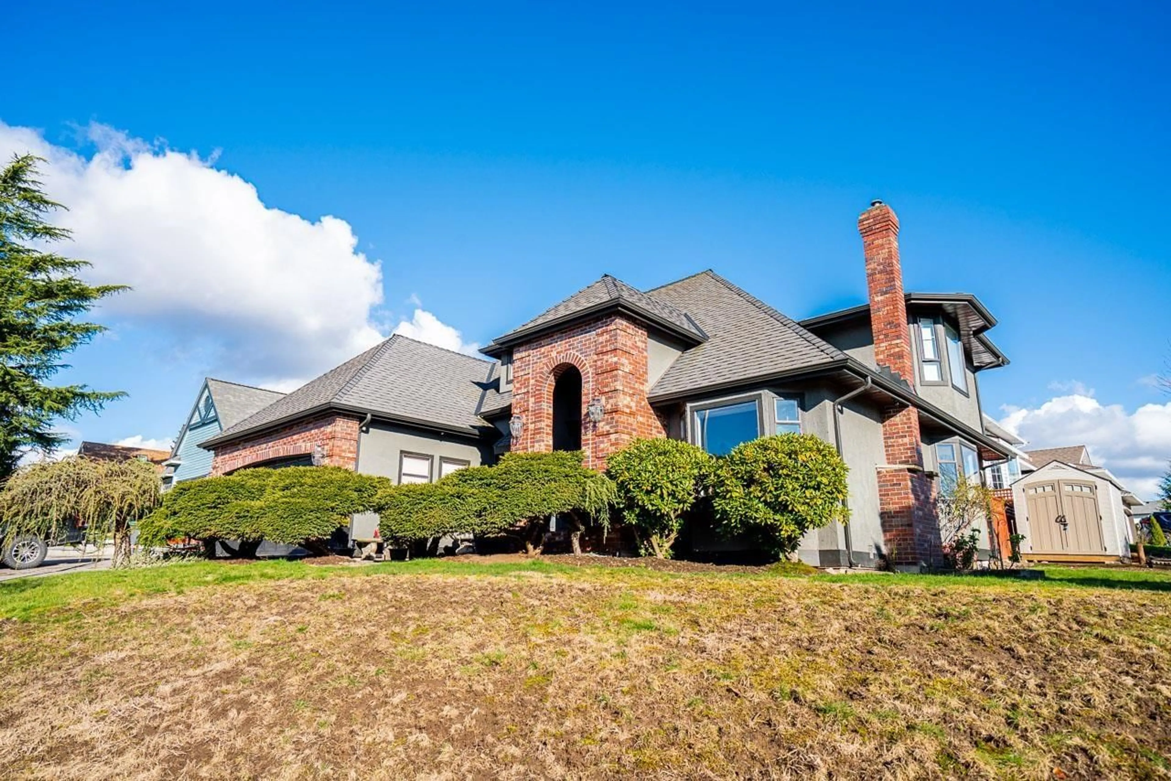 Home with brick exterior material, unknown for 18459 56A AVENUE, Surrey British Columbia V3S7E4