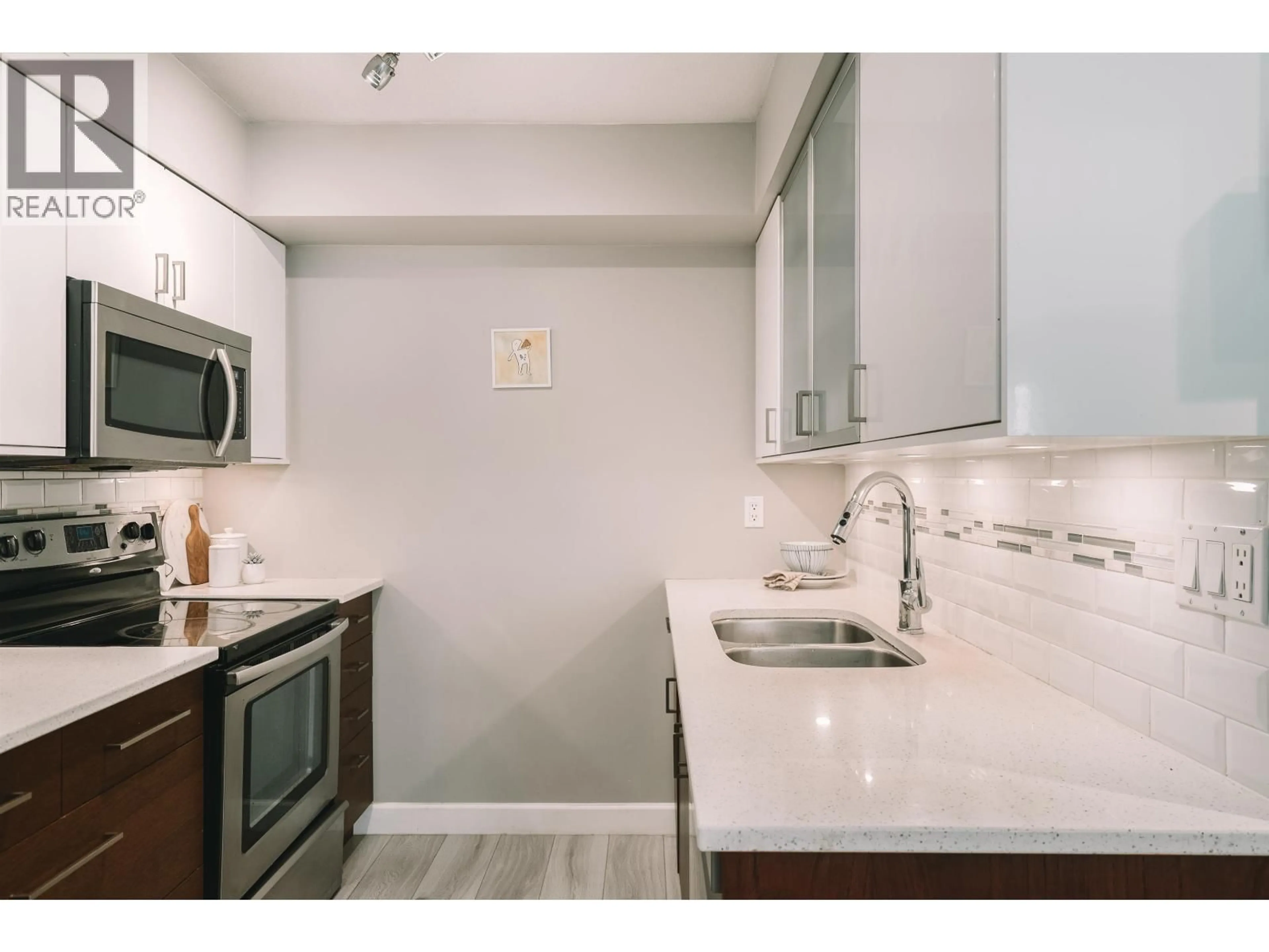 Standard kitchen, ceramic/tile floor for 102 - 1516 1ST AVENUE, Vancouver British Columbia V5N1A5