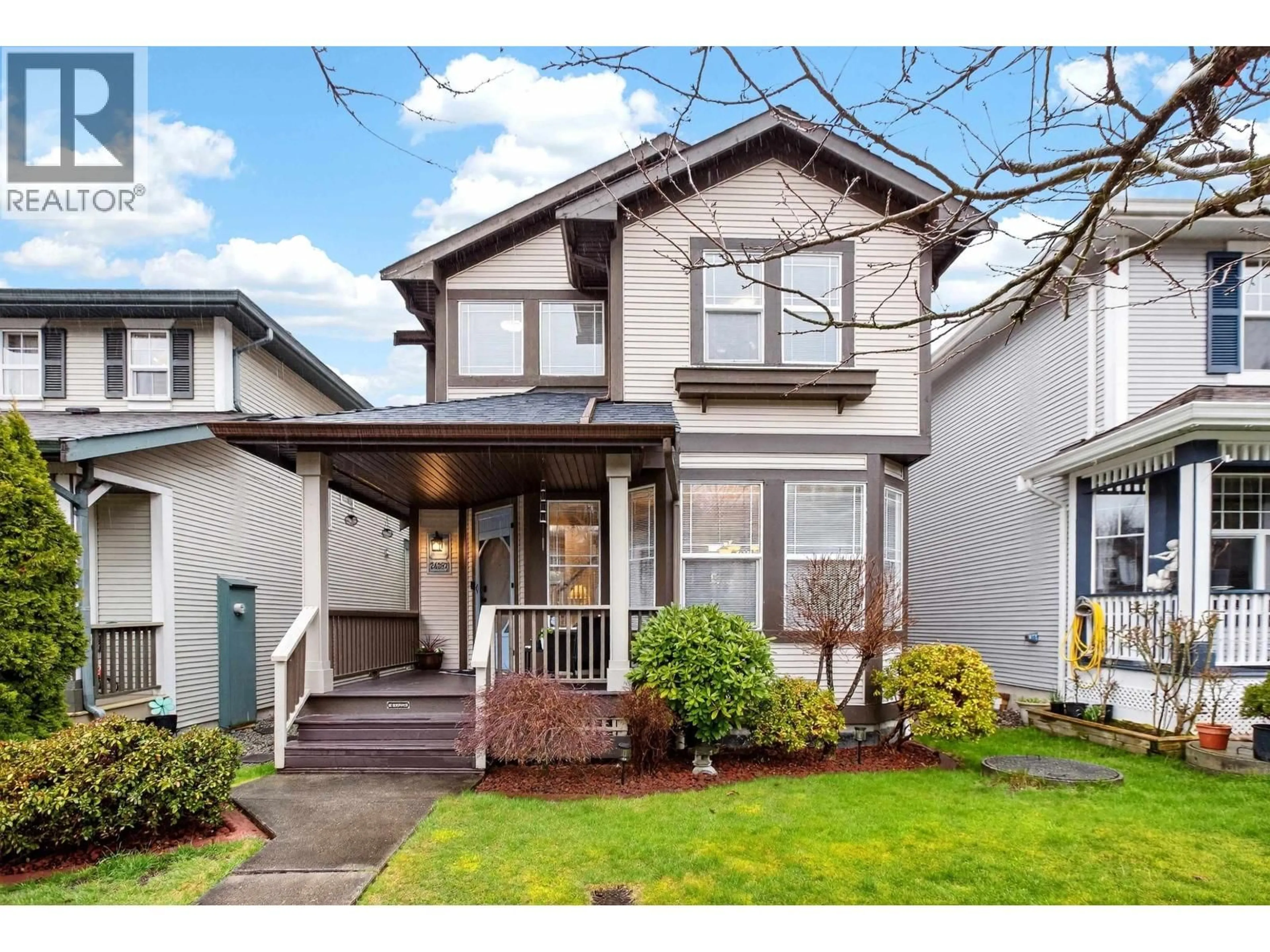 Home with vinyl exterior material, street for 24387 101A AVENUE, Maple Ridge British Columbia V2W1W6