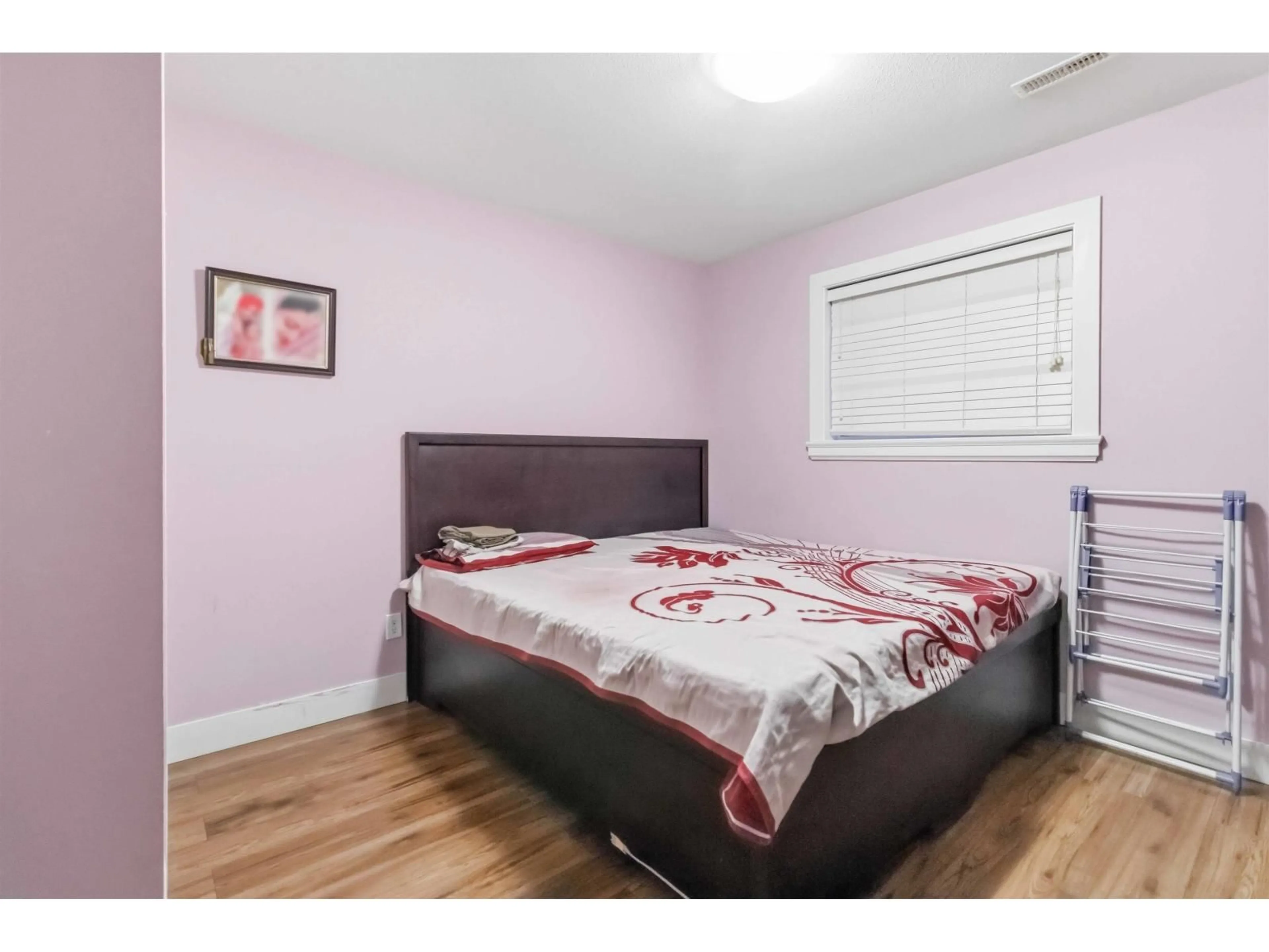 Bedroom with bed, wood/laminate floor for 8546 ALEXANDRA STREET, Mission British Columbia V4S1A2