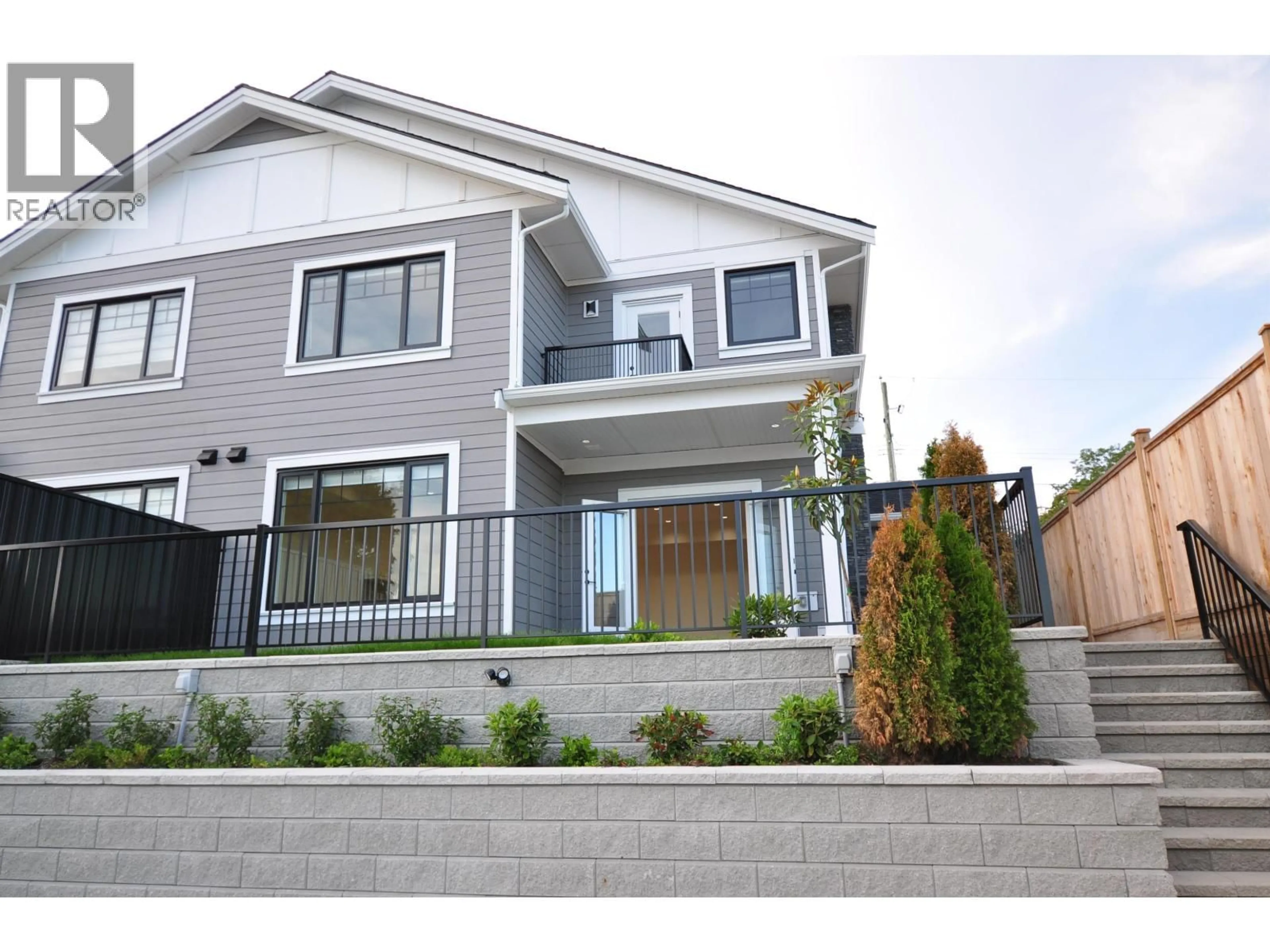 Home with vinyl exterior material, street for 104 - 1138 DANSEY AVENUE, Coquitlam British Columbia V3K3H4