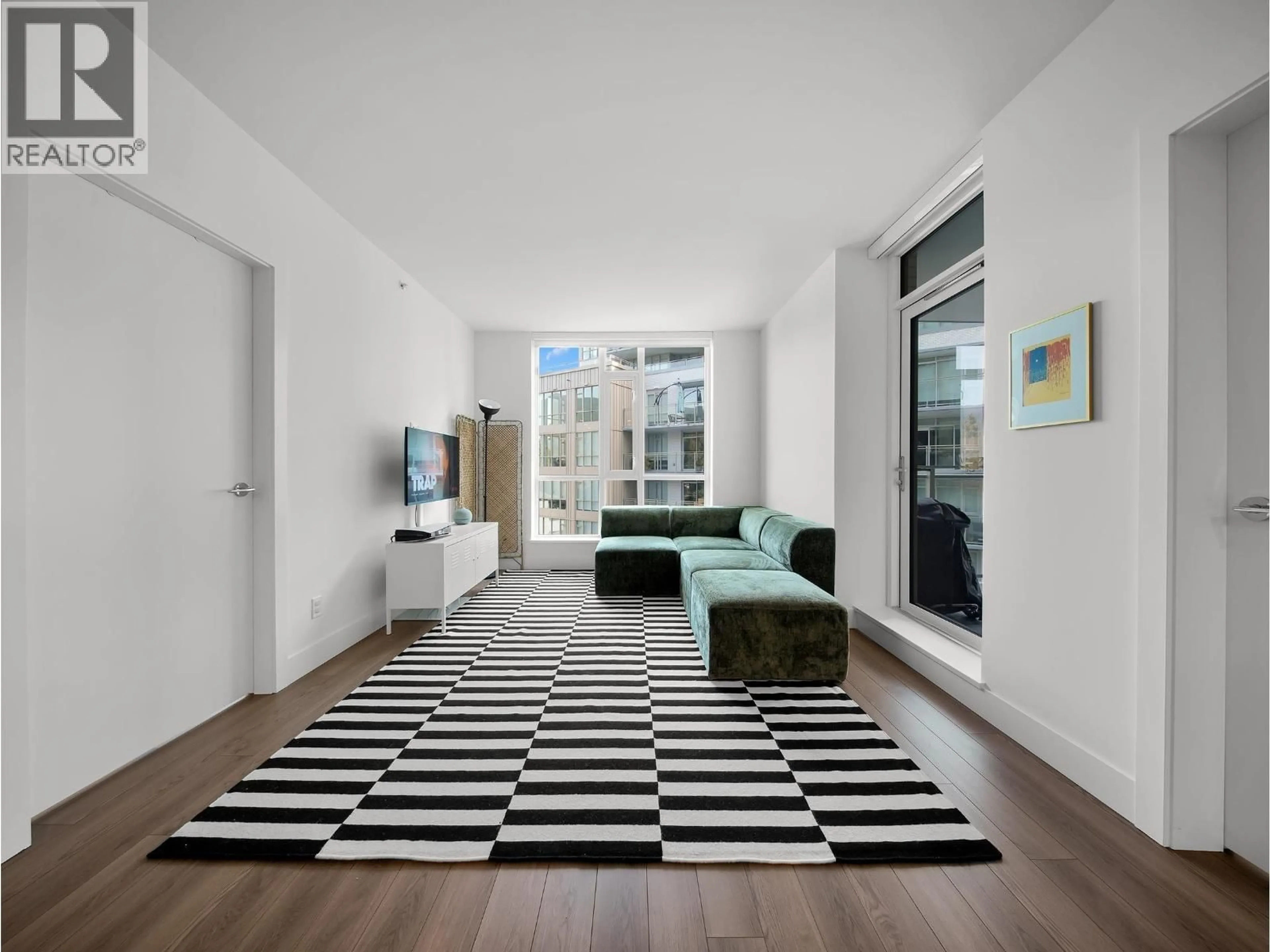 Living room with furniture, unknown for 404 - 2375 EMERY COURT, North Vancouver British Columbia V7J0E8