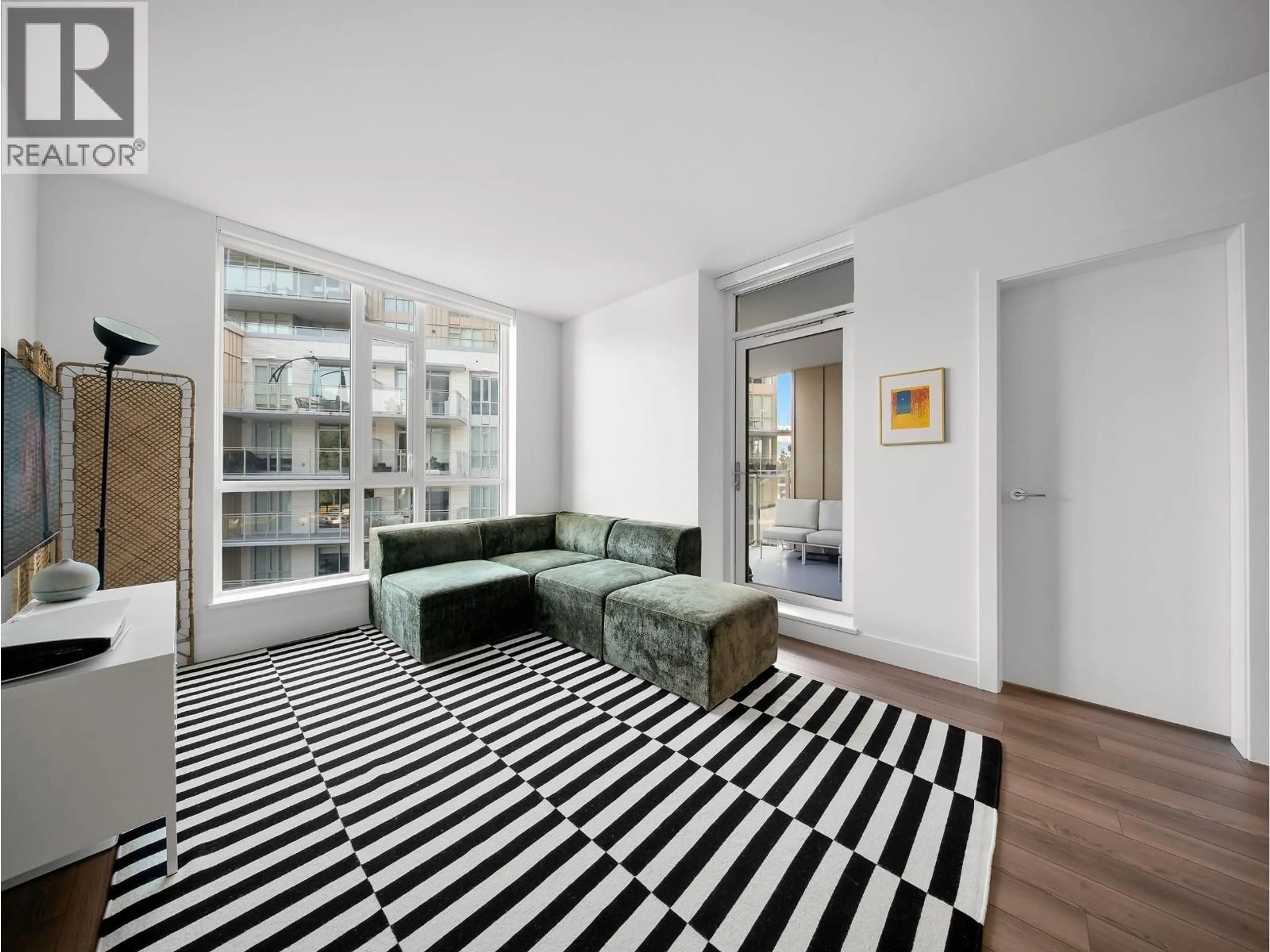 Living room with furniture, unknown for 404 - 2375 EMERY COURT, North Vancouver British Columbia V7J0E8