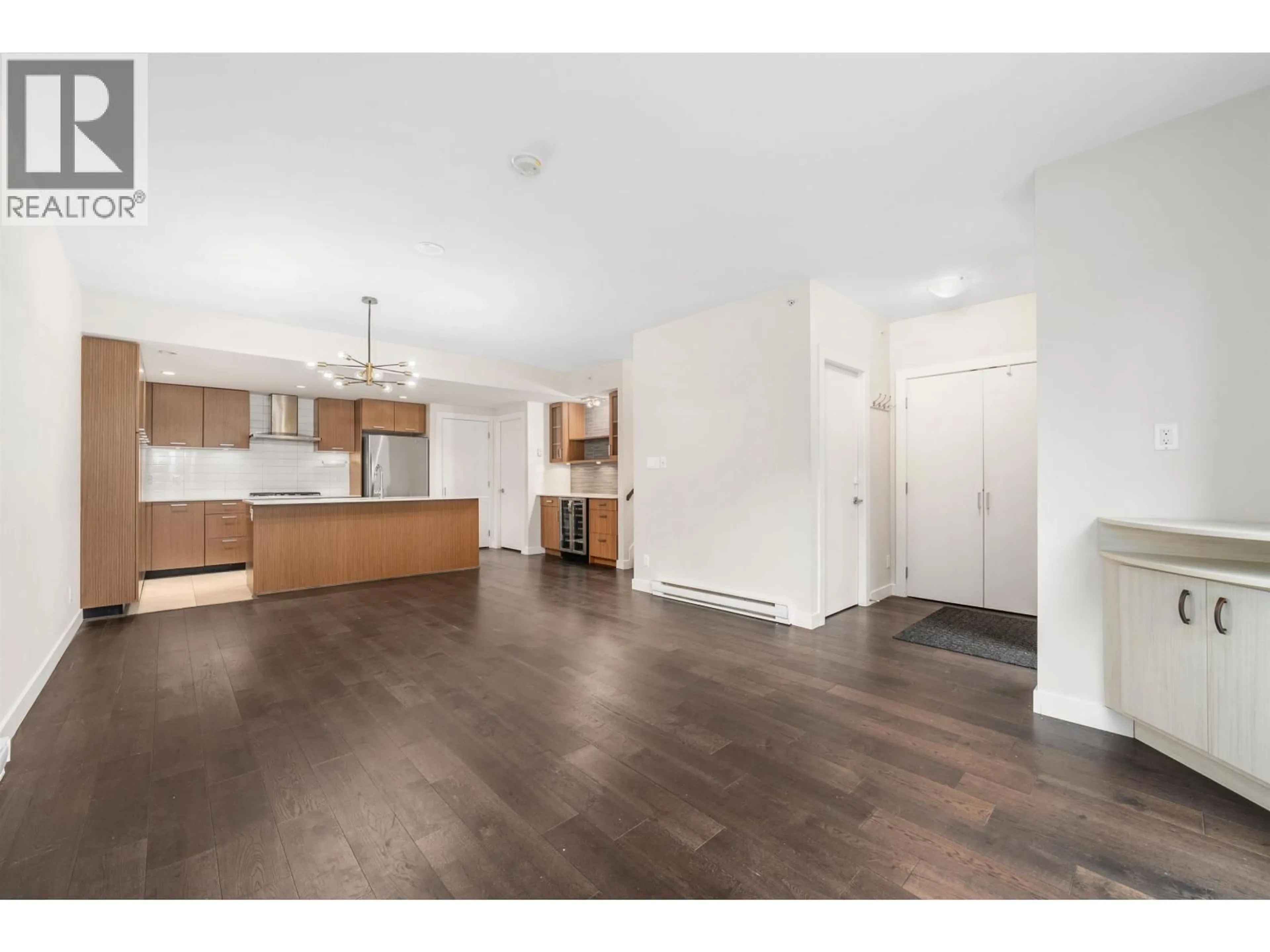 Open concept kitchen, wood/laminate floor for 2389 SCOTIA STREET, Vancouver British Columbia V5T0B2