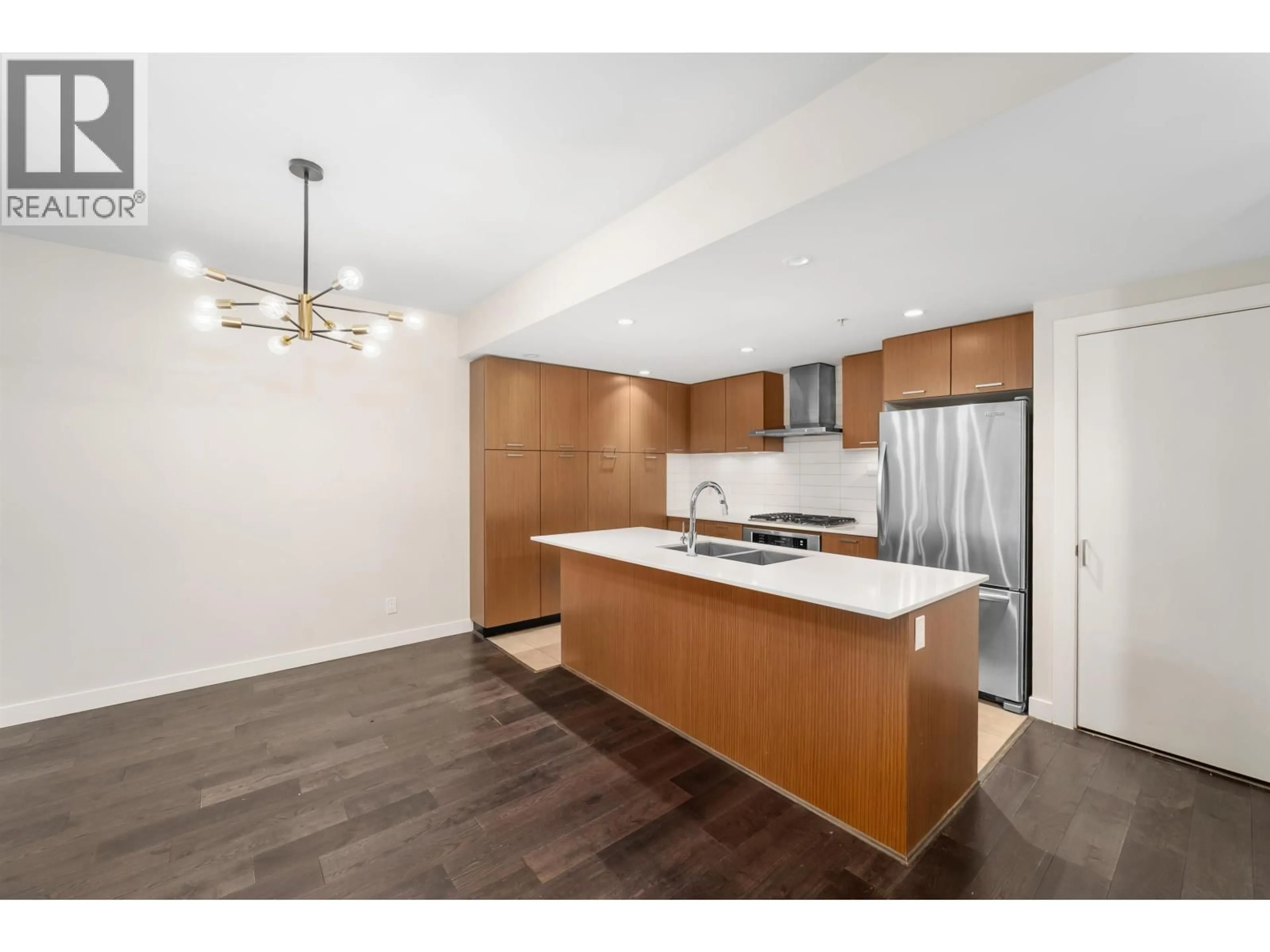 Open concept kitchen, wood/laminate floor for 2389 SCOTIA STREET, Vancouver British Columbia V5T0B2