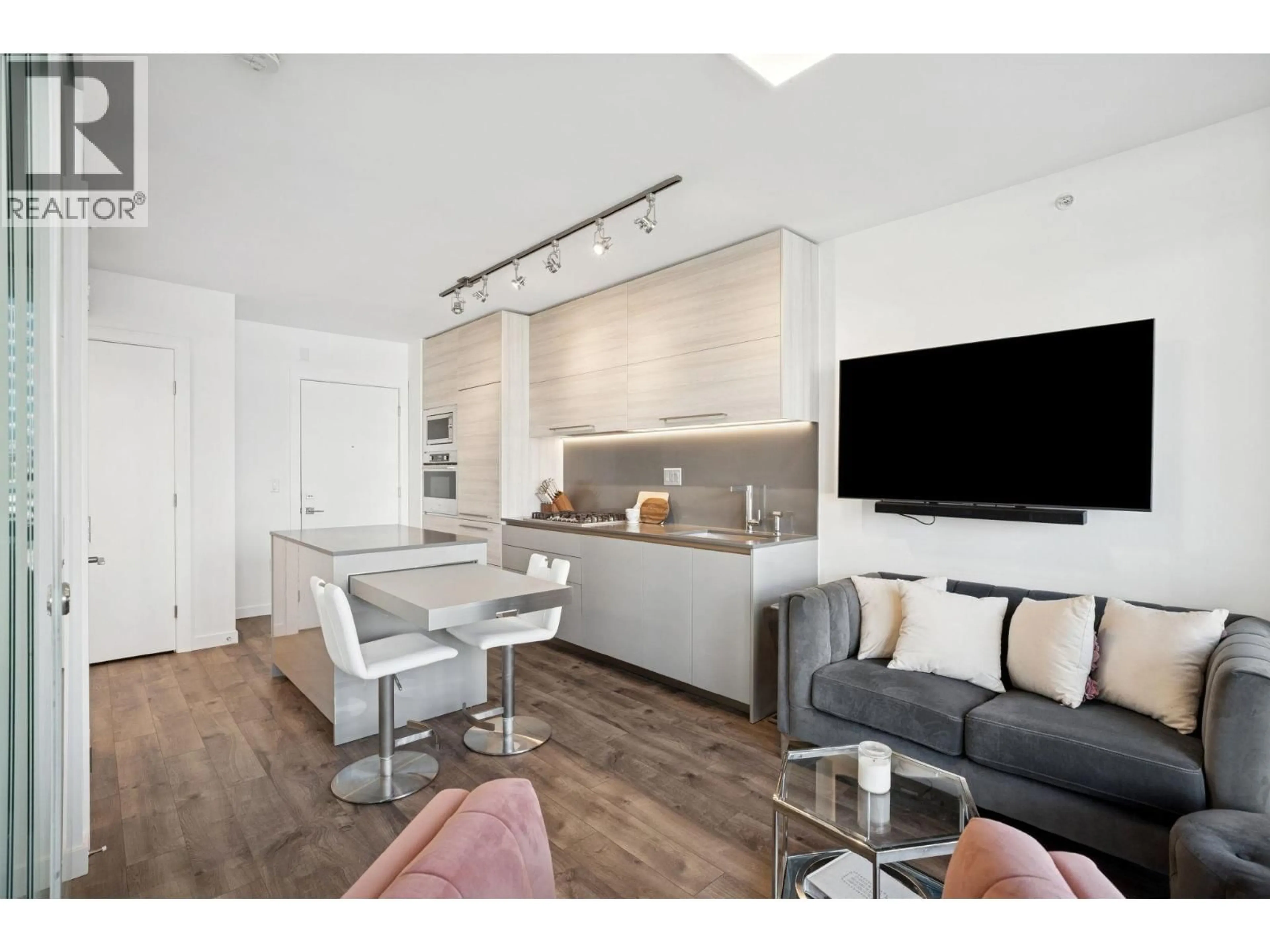 Open concept kitchen, wood/laminate floor for 802 - 4488 JUNEAU STREET, Burnaby British Columbia V5C0M4