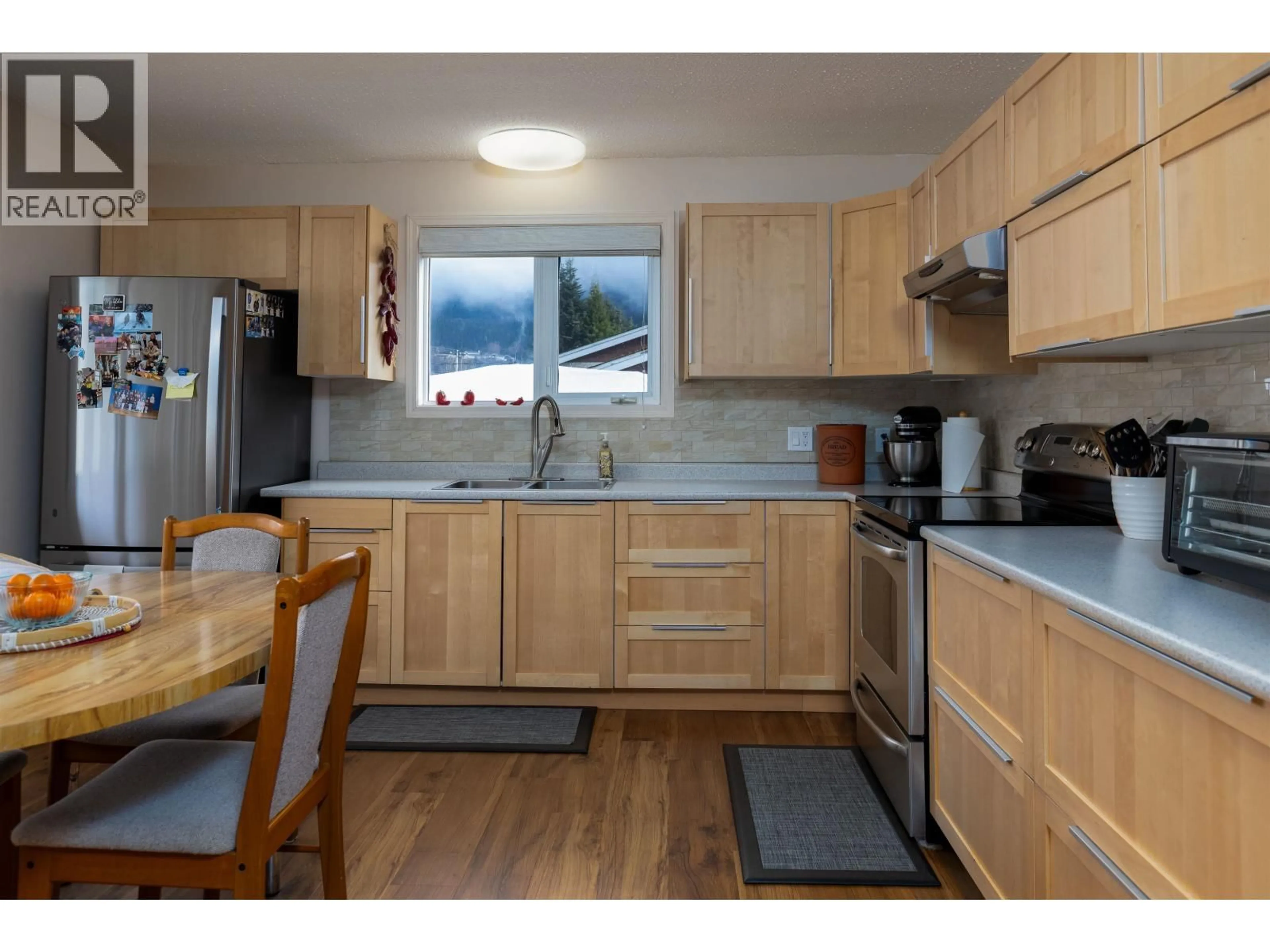 Standard kitchen, wood/laminate floor for 4821 TUCK AVENUE, Terrace British Columbia V8G4L8