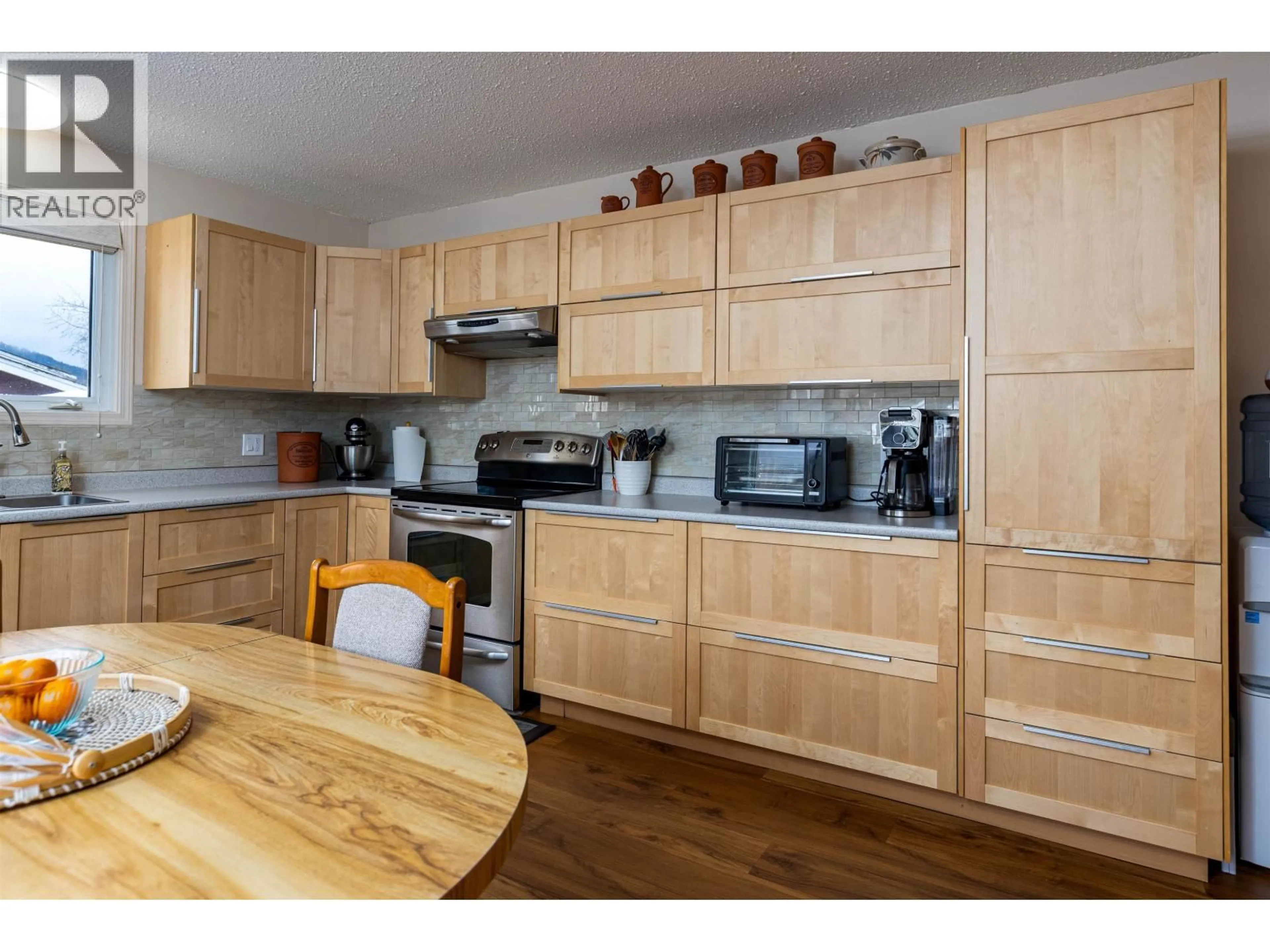 Standard kitchen, wood/laminate floor for 4821 TUCK AVENUE, Terrace British Columbia V8G4L8