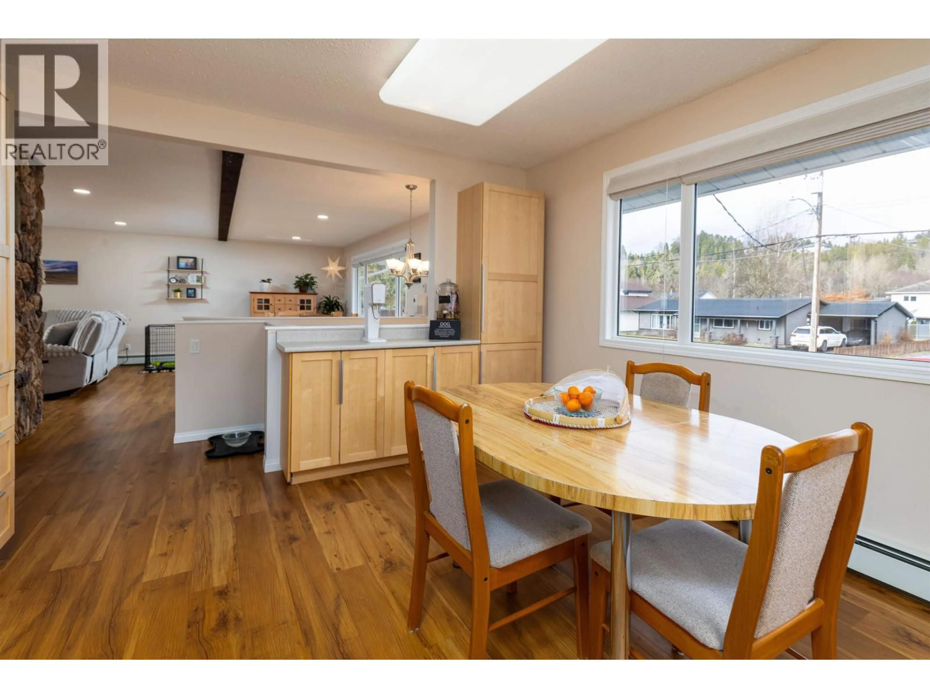 Open concept kitchen, wood/laminate floor for 4821 TUCK AVENUE, Terrace British Columbia V8G4L8