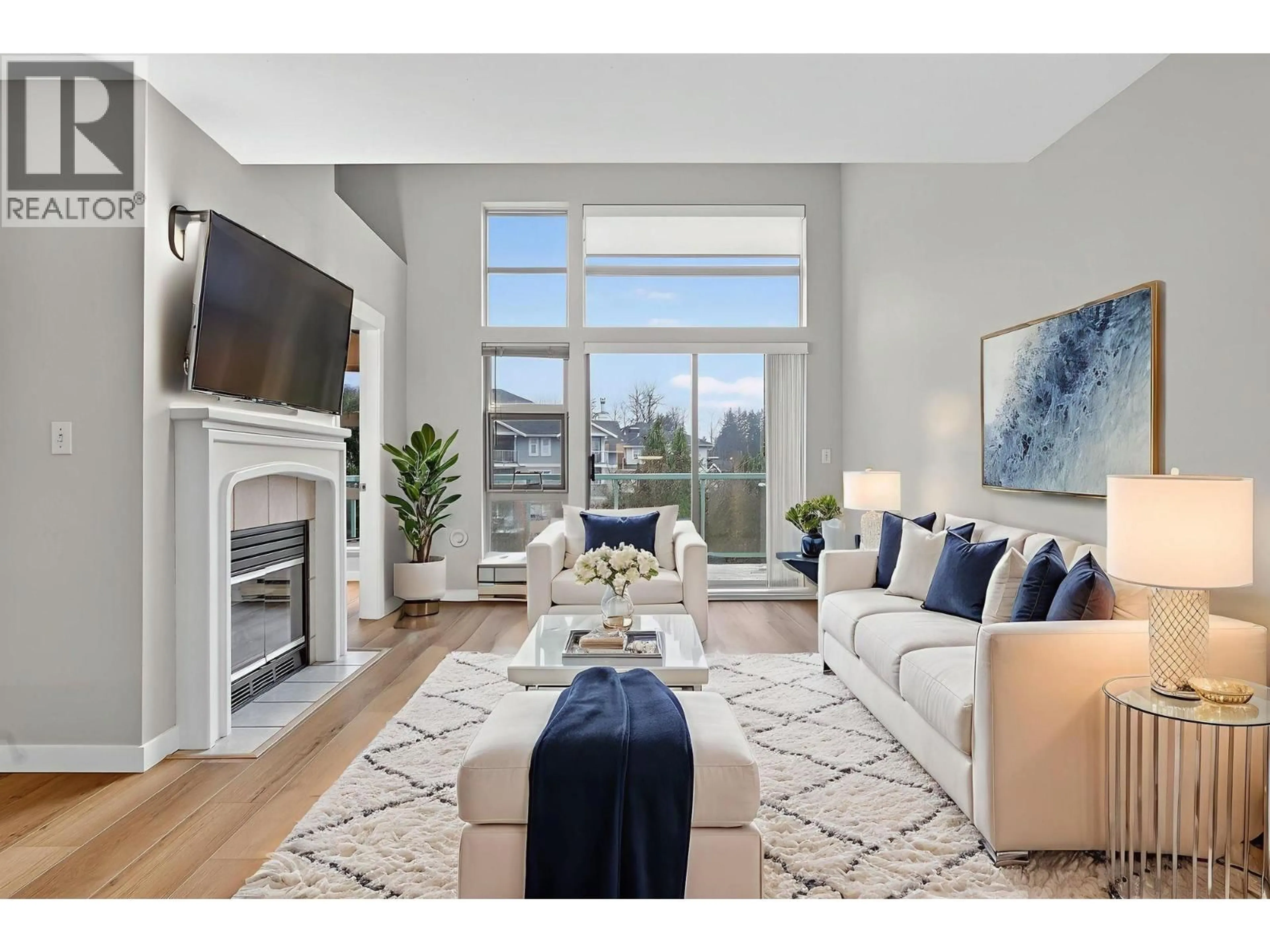 Living room with furniture, unknown for 401 - 301 MAUDE ROAD, Port Moody British Columbia V3H5B1