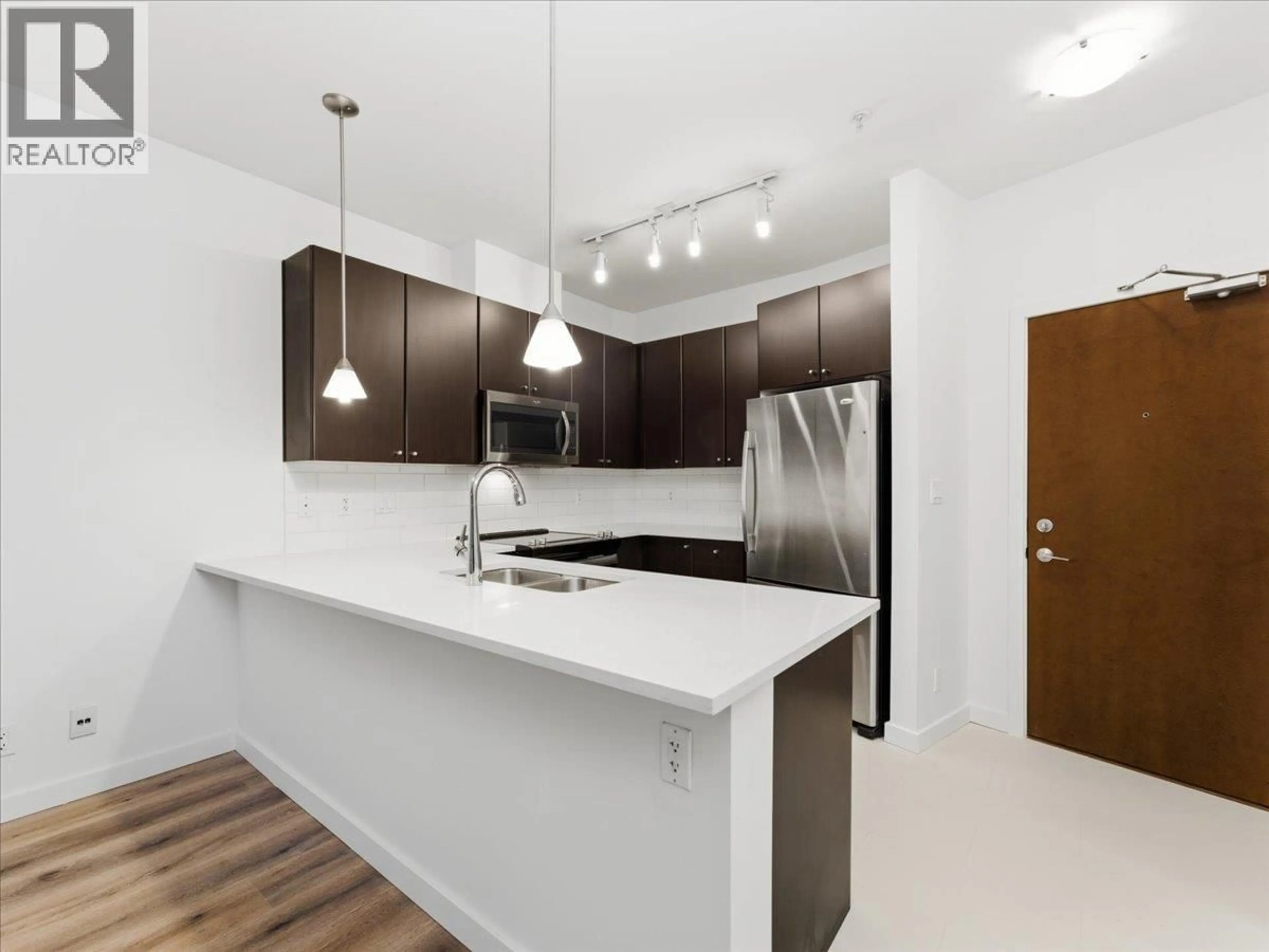 Open concept kitchen, unknown for 103 - 225 FRANCIS WAY, New Westminster British Columbia V3L0G1
