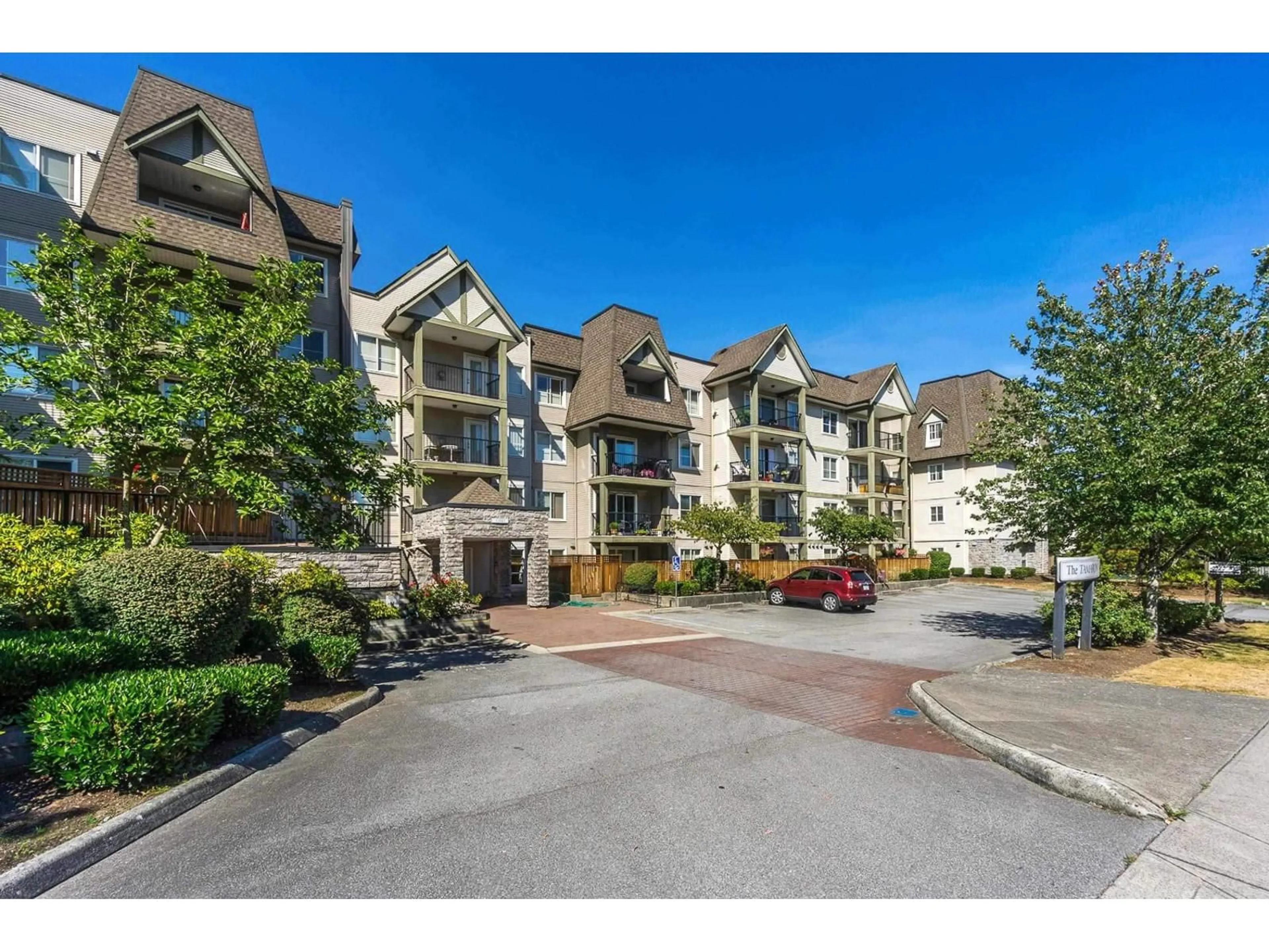 A pic from outside/outdoor area/front of a property/back of a property/a pic from drone, mountain view for 306 - 12083 92A AVENUE, Surrey British Columbia V3V8C8