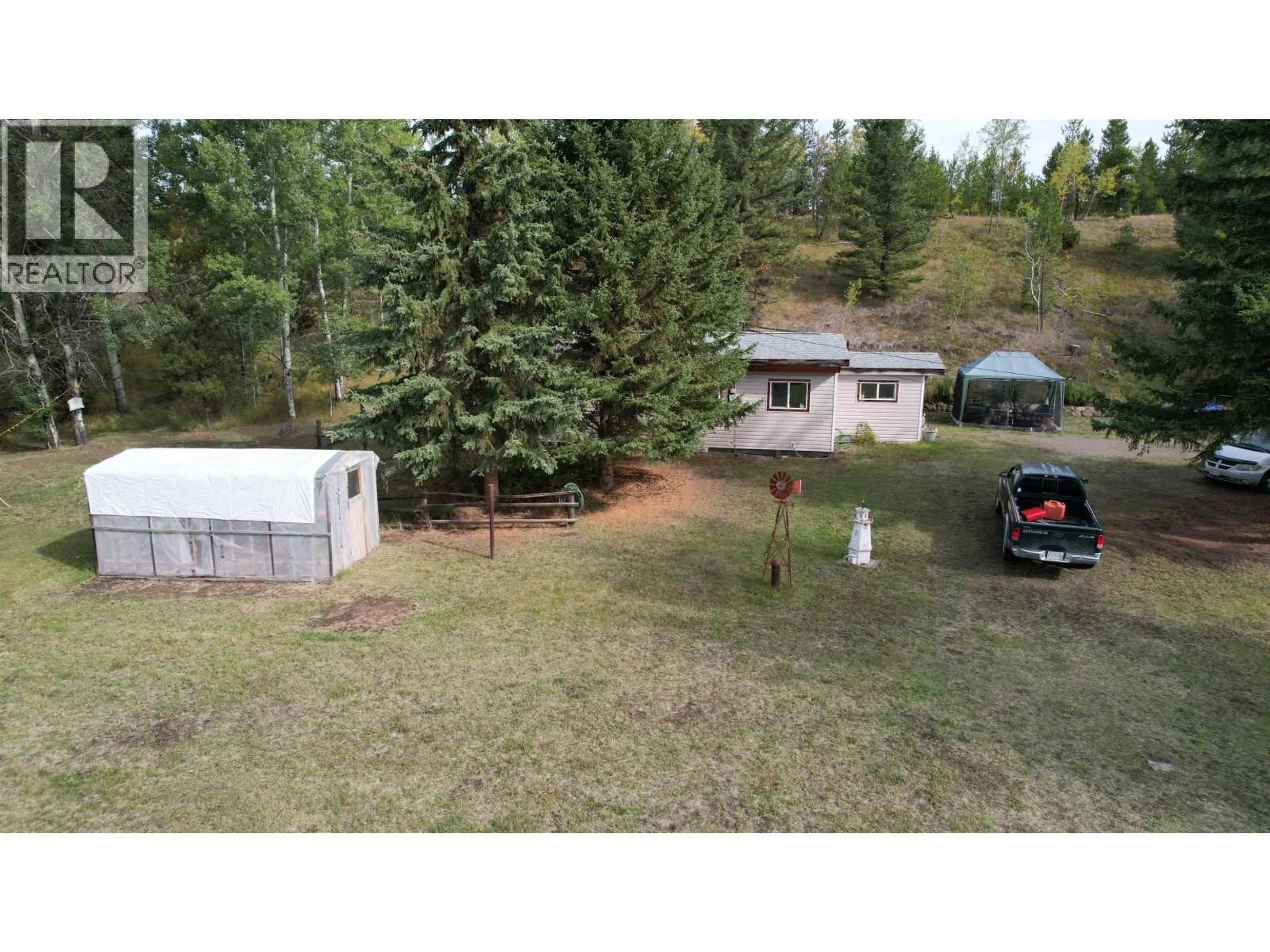 A pic from outside/outdoor area/front of a property/back of a property/a pic from drone, mountain view for 8043 83 MILE ROAD, Lone Butte British Columbia V0K2E2
