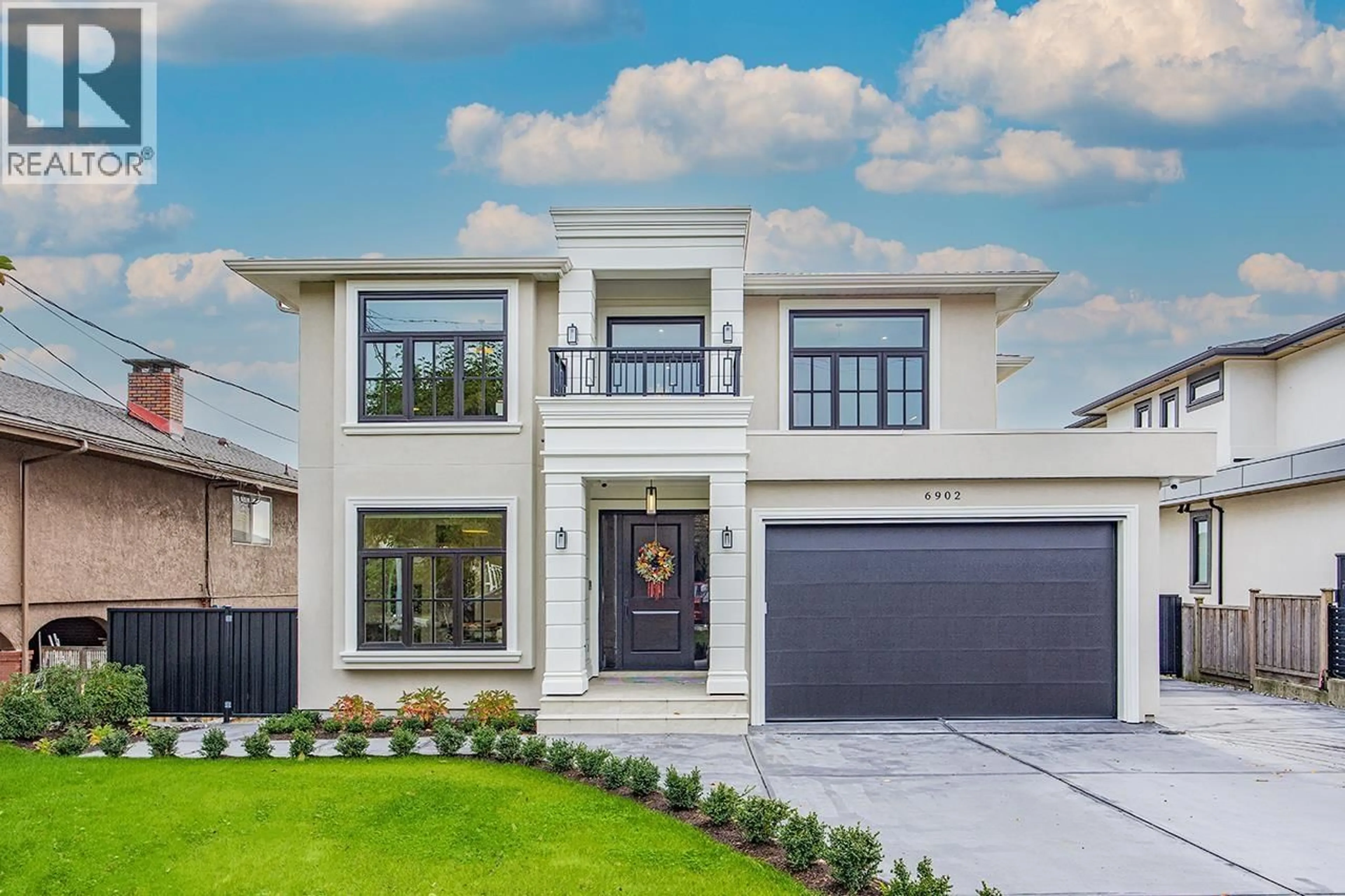 Home with vinyl exterior material, street for 6902 KITCHENER STREET, Burnaby British Columbia V5B2J9