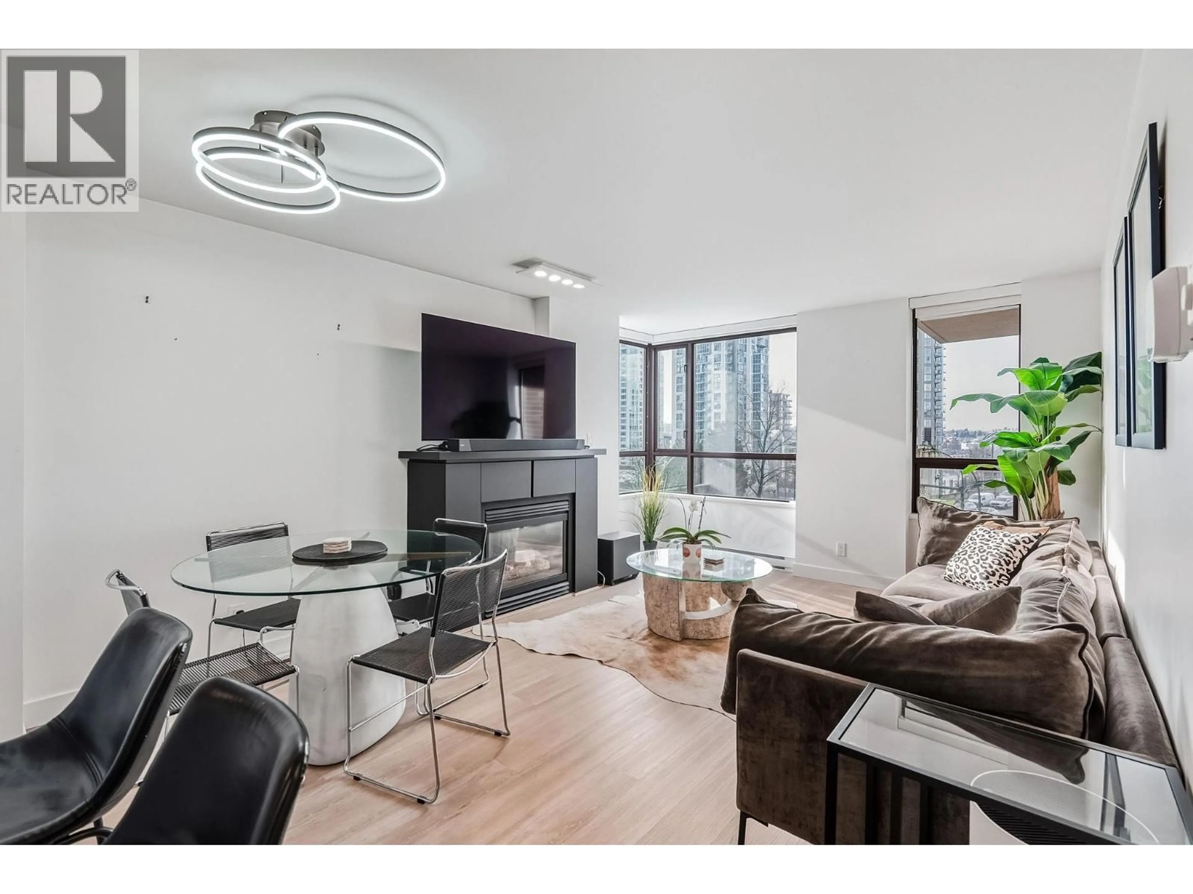 Living room with furniture, wood/laminate floor for 402 - 1003 PACIFIC STREET, Vancouver British Columbia V6E4P2