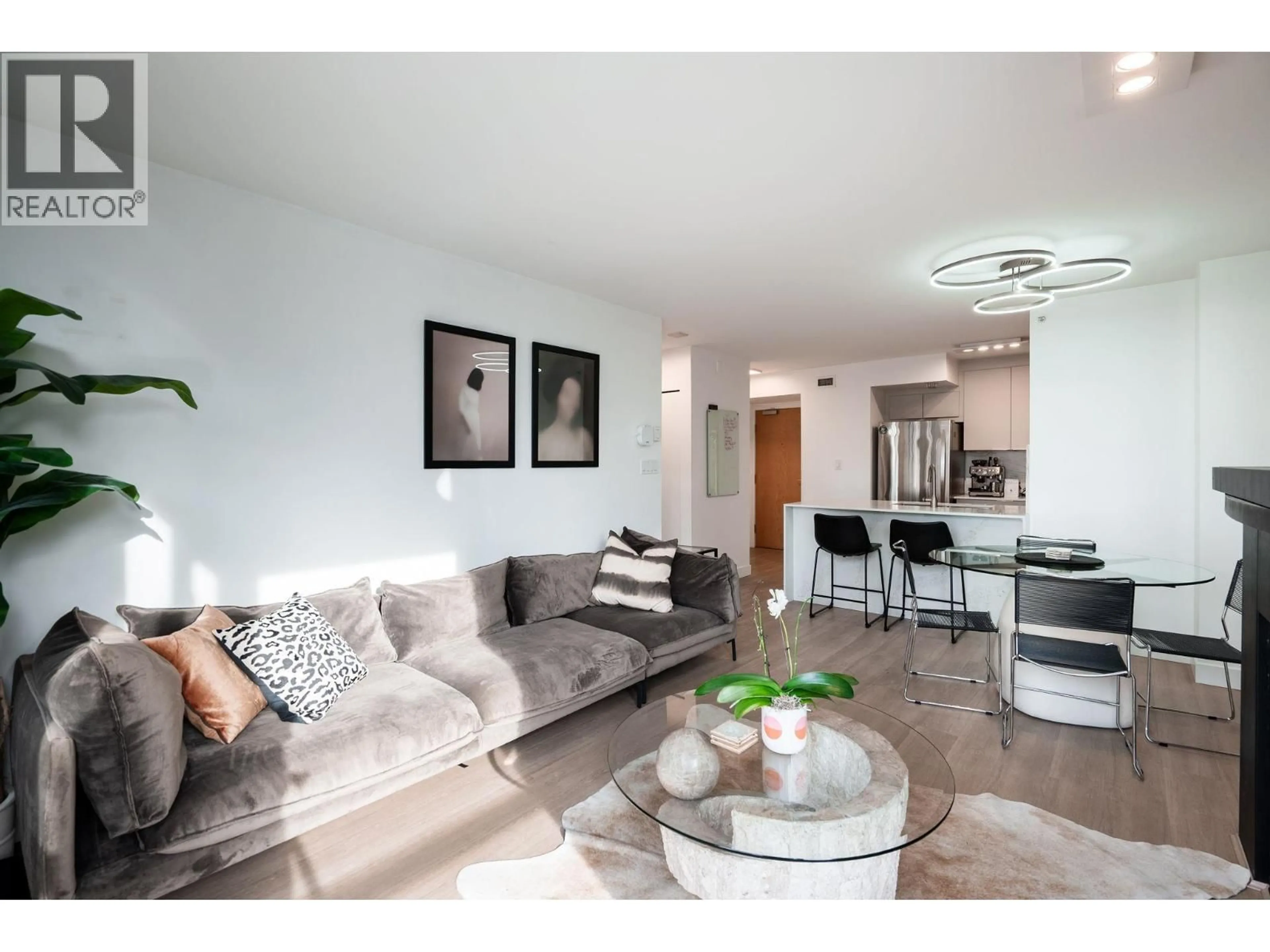 Living room with furniture, wood/laminate floor for 402 - 1003 PACIFIC STREET, Vancouver British Columbia V6E4P2