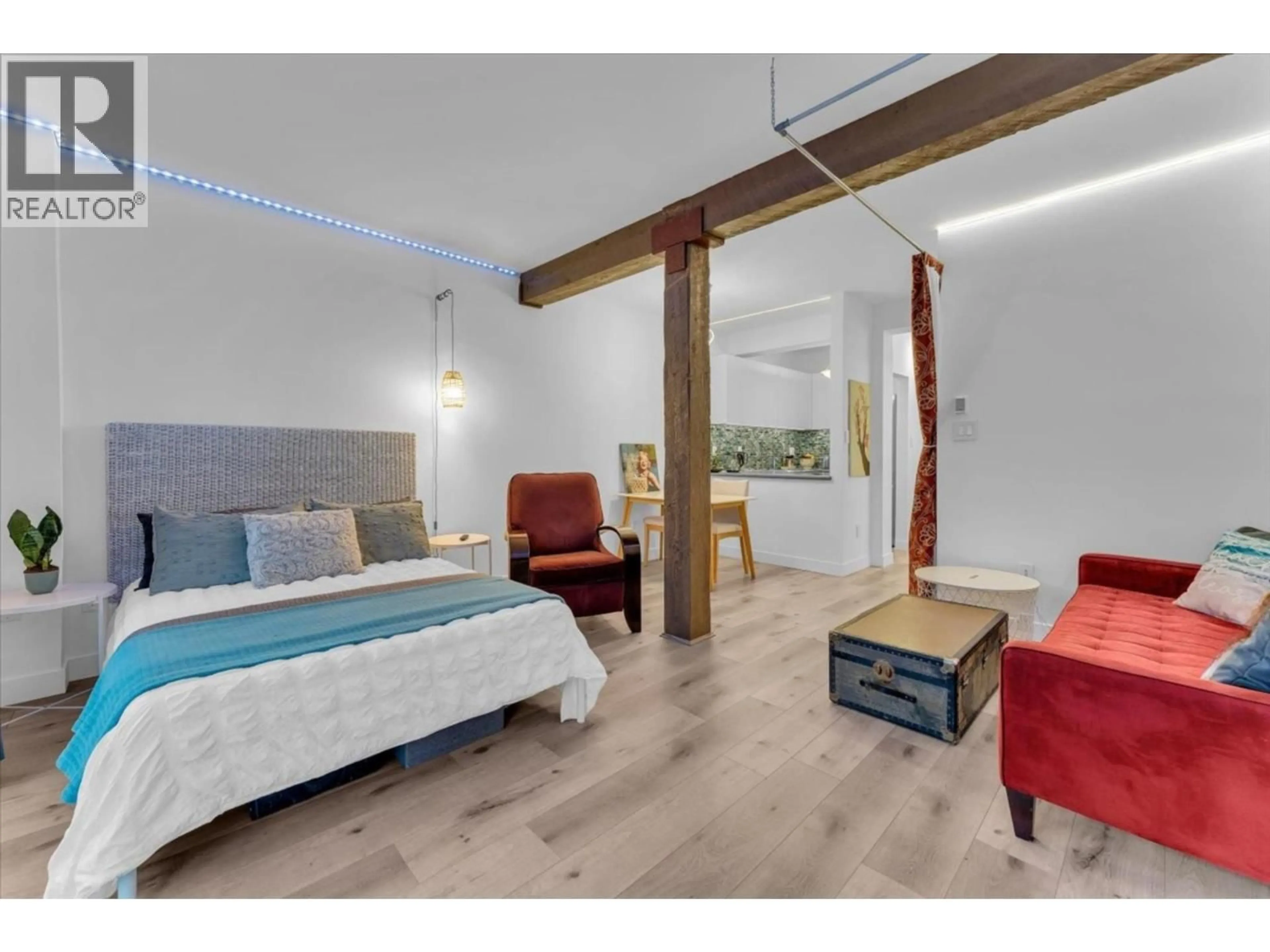 Bedroom with bed, wood/laminate floor for 207 - 1655 NELSON STREET, Vancouver British Columbia V6G1M4