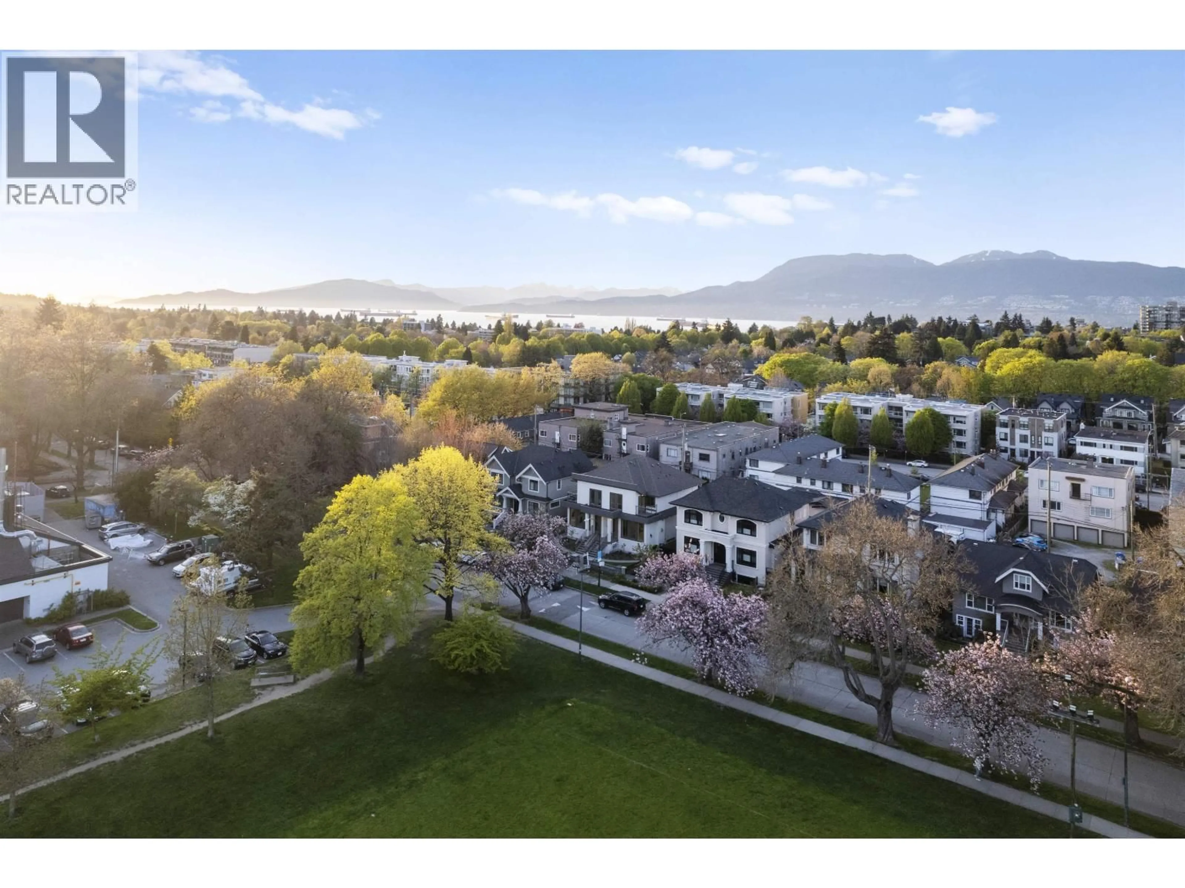 A pic from outside/outdoor area/front of a property/back of a property/a pic from drone, mountain view for 2455 10TH AVENUE, Vancouver British Columbia V6K2J4