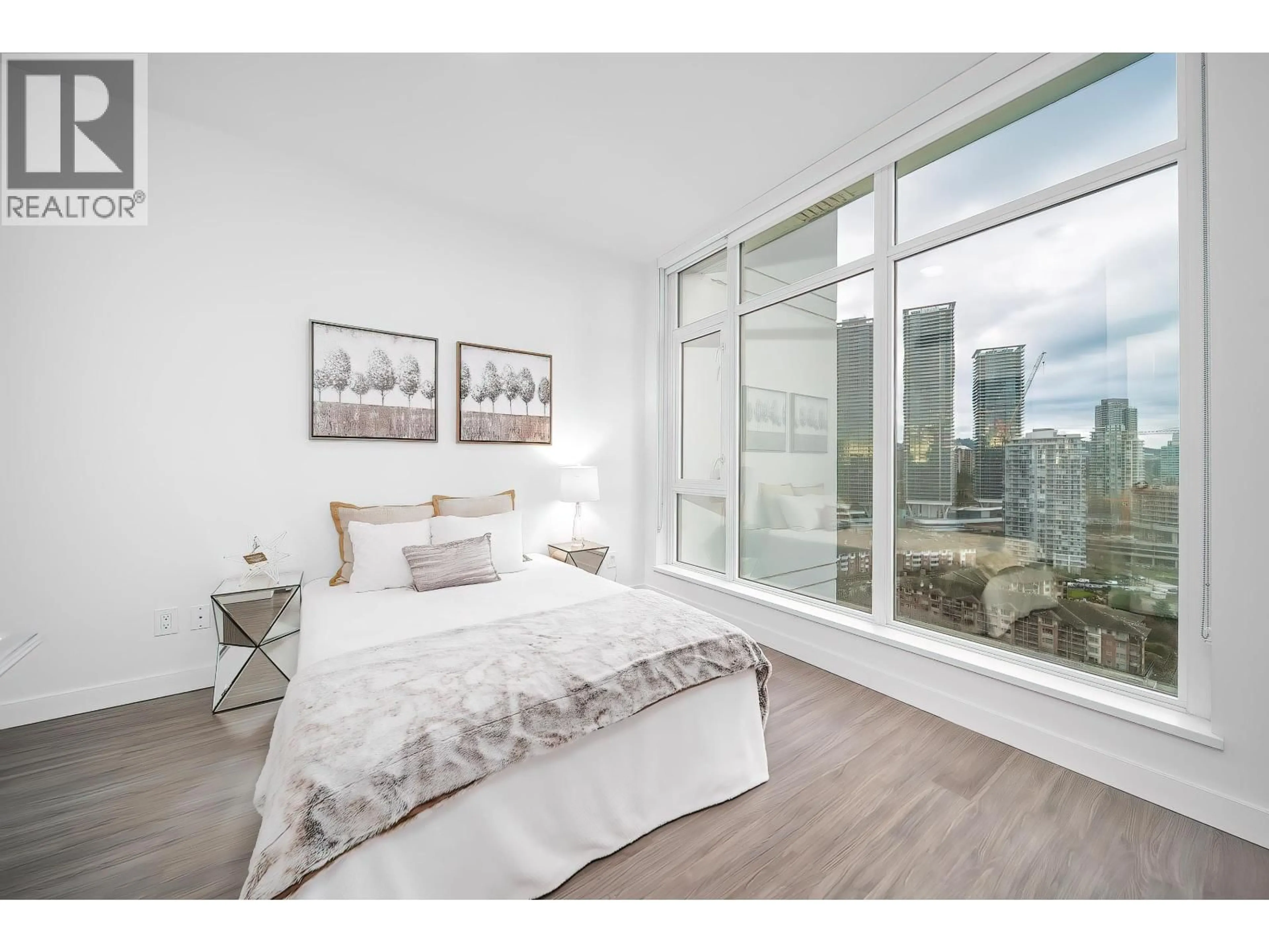 Bedroom with bed, wood/laminate floor for 1701 - 2288 ALPHA AVENUE, Burnaby British Columbia V5C0L9