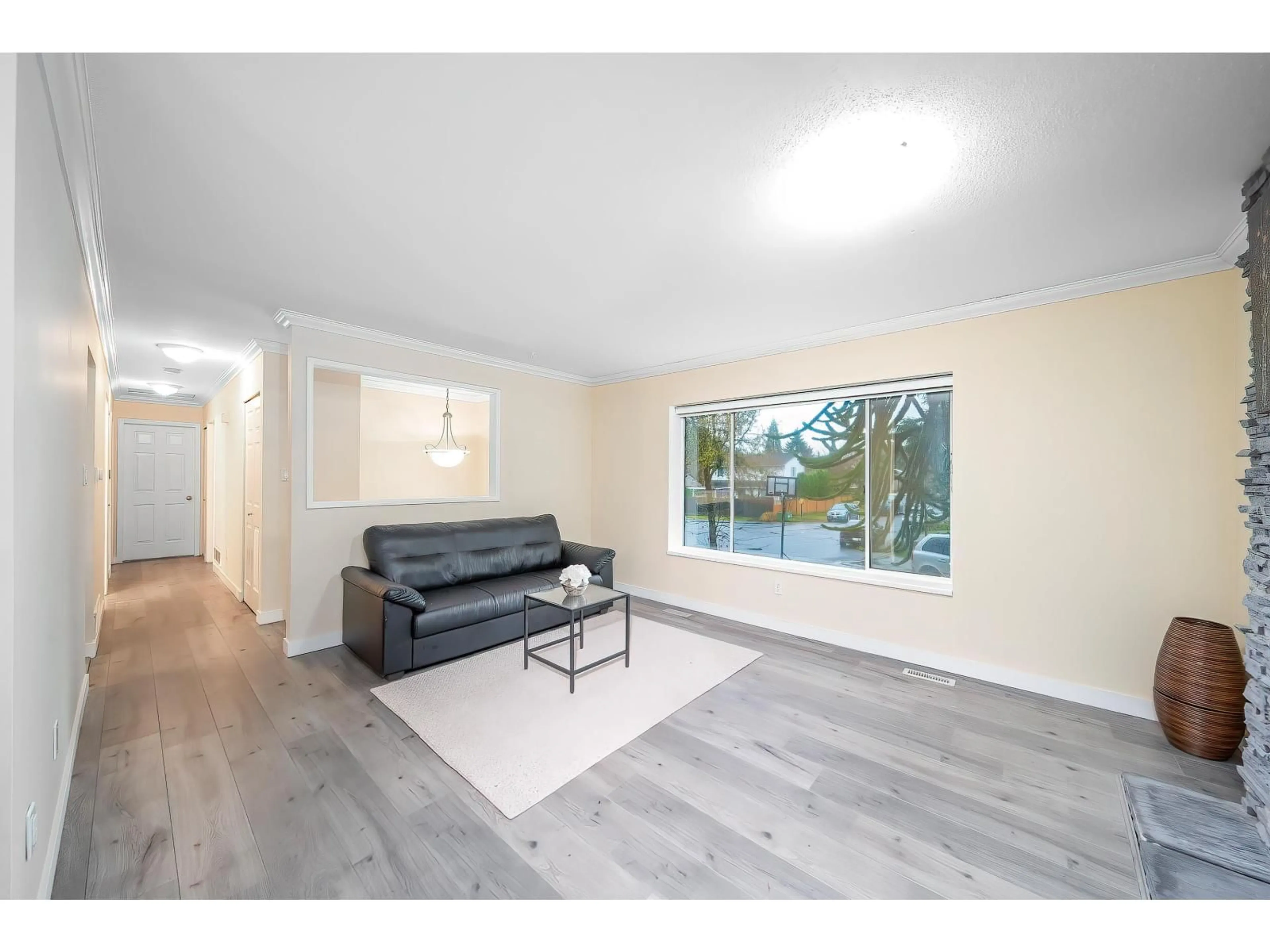 Living room with furniture, wood/laminate floor for 10123 158A STREET, Surrey British Columbia V4N2P8