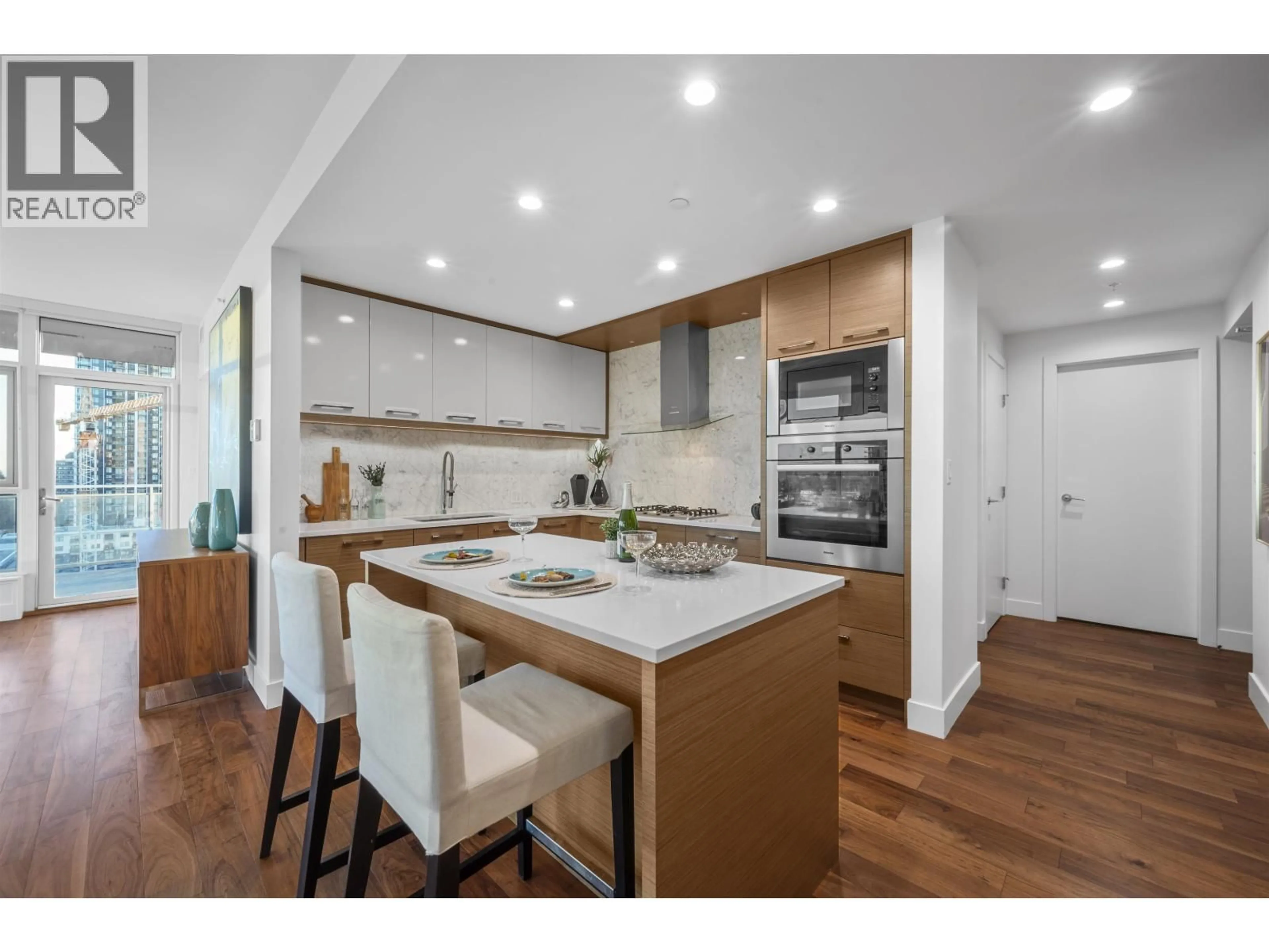 Open concept kitchen, wood/laminate floor for 1005 - 4360 BERESFORD STREET, Burnaby British Columbia V5H0G2
