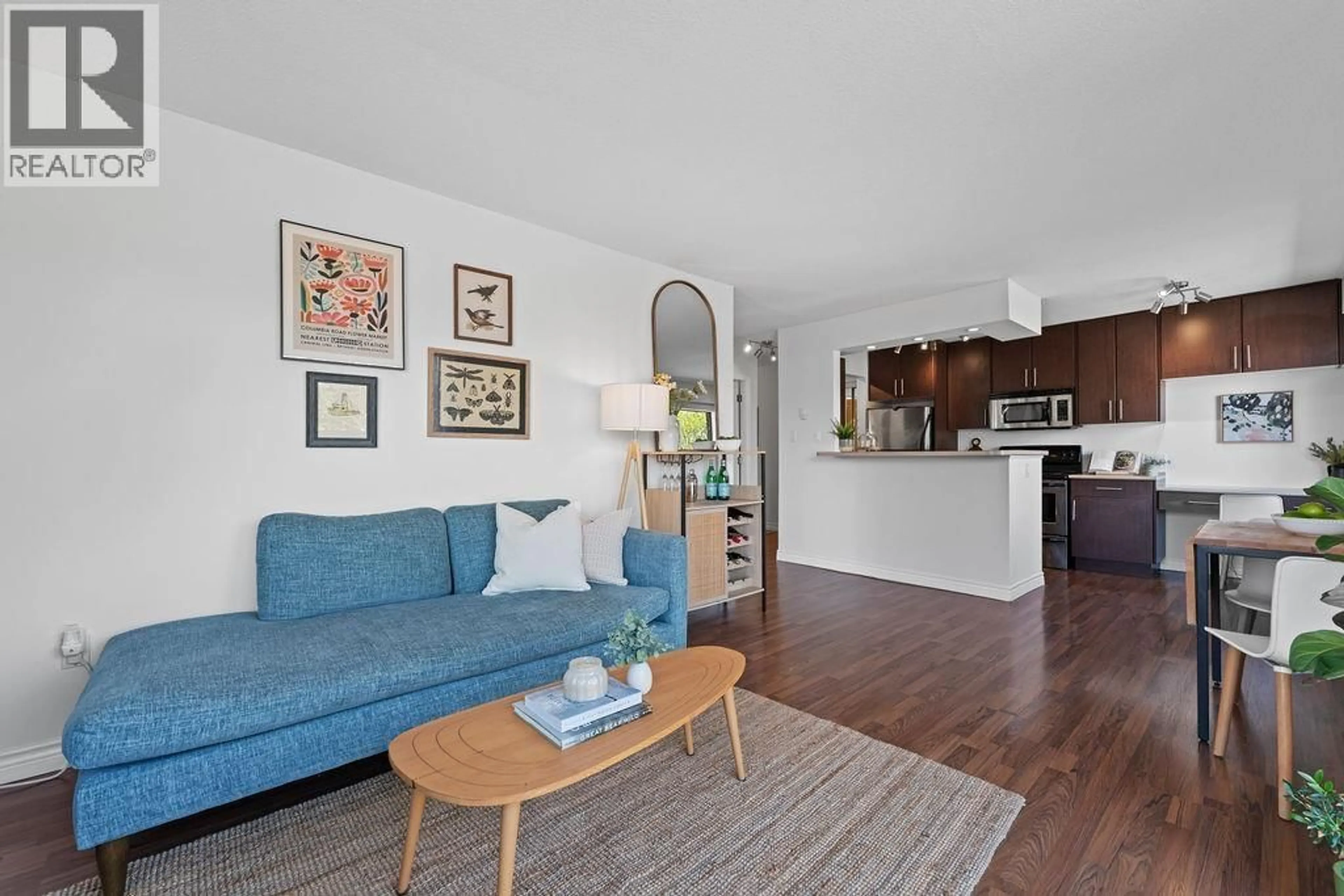 Living room with furniture, wood/laminate floor for 305 - 2330 MAPLE STREET, Vancouver British Columbia V6J3T6