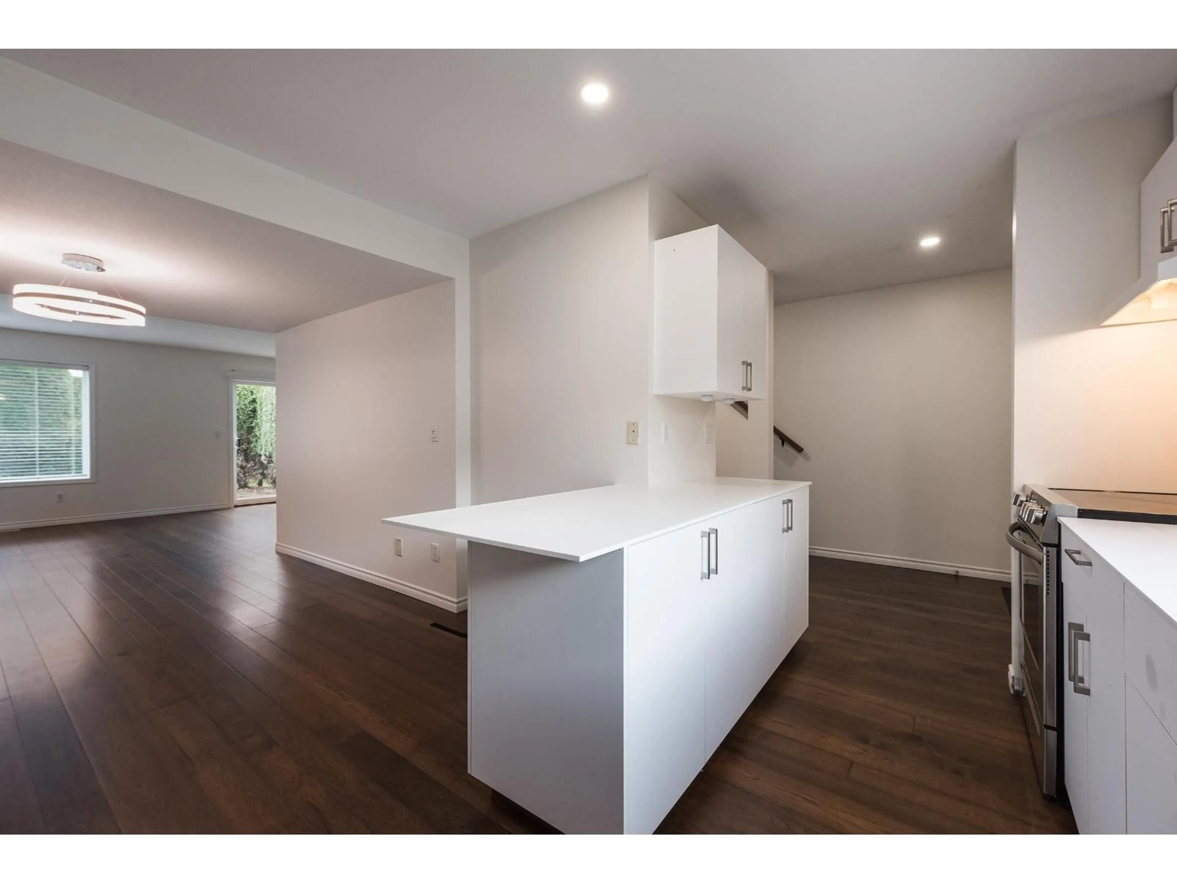 Open concept kitchen, wood/laminate floor for 97 - 45185 WOLFE ROAD, Chilliwack British Columbia V2P1V5