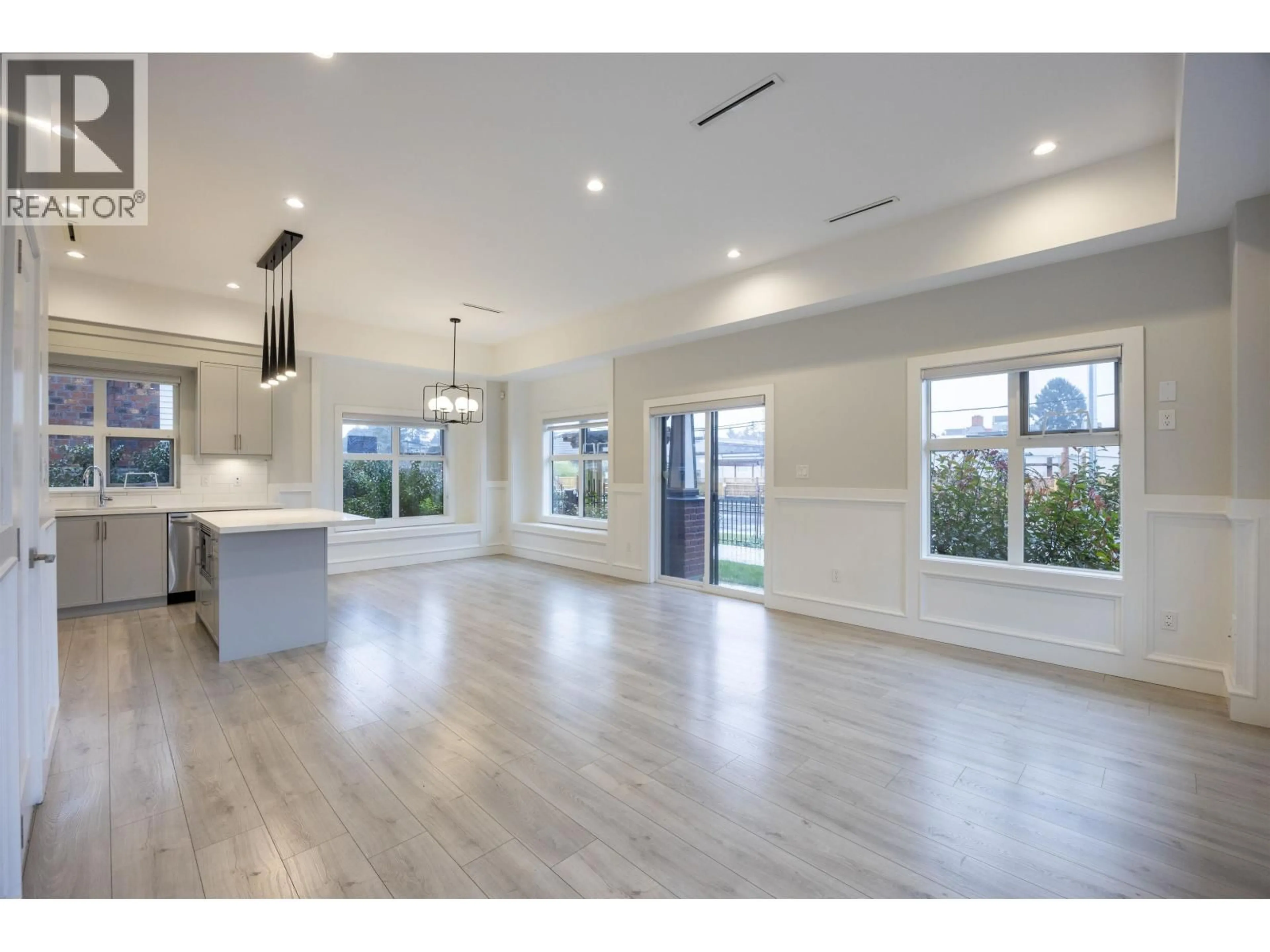 Open concept kitchen, wood/laminate floor for 5 - 9899 STEVESTON HIGHWAY, Richmond British Columbia V7A1M9