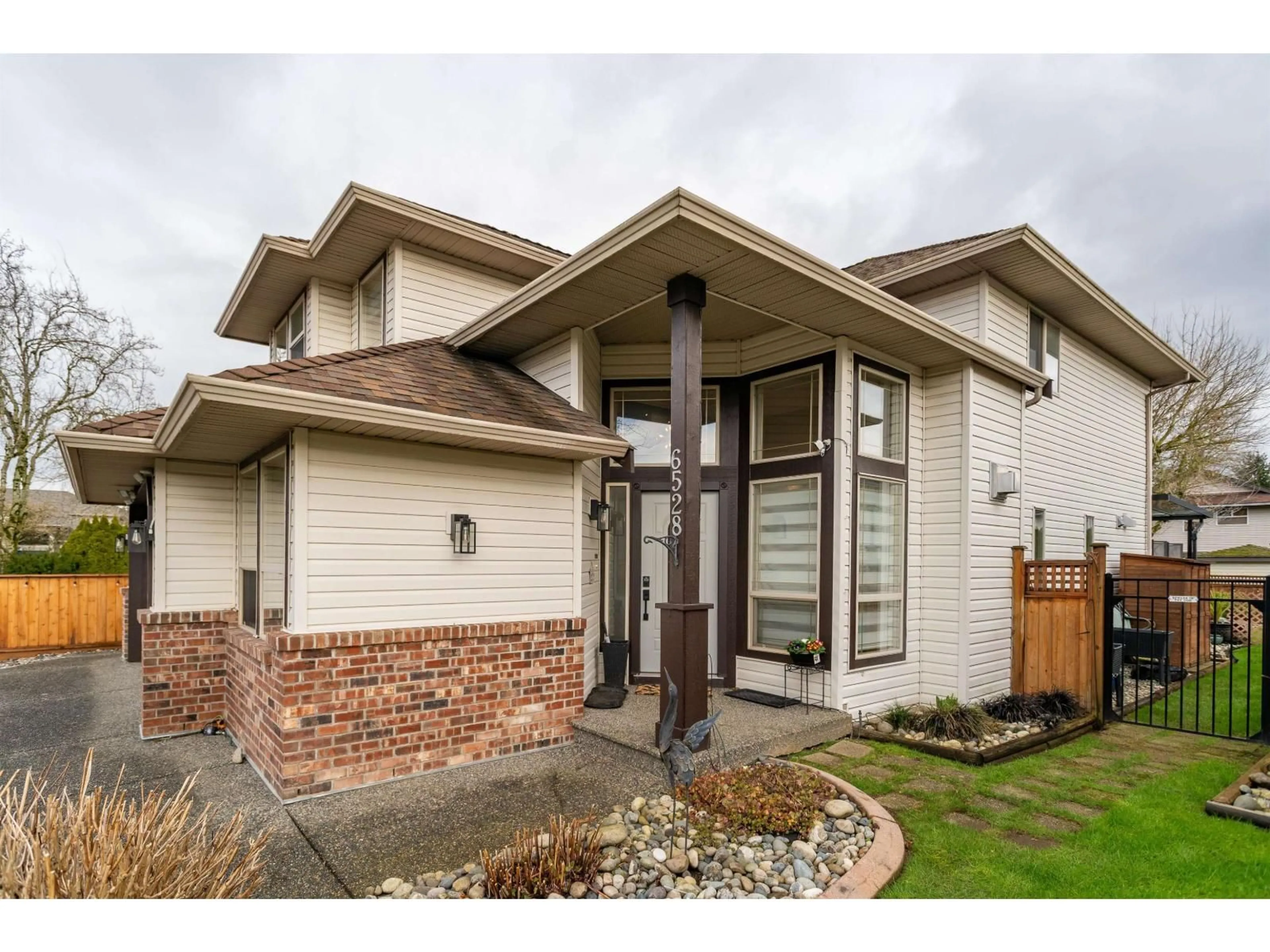 Home with brick exterior material, street for 6528 187A STREET, Surrey British Columbia V3S8V2
