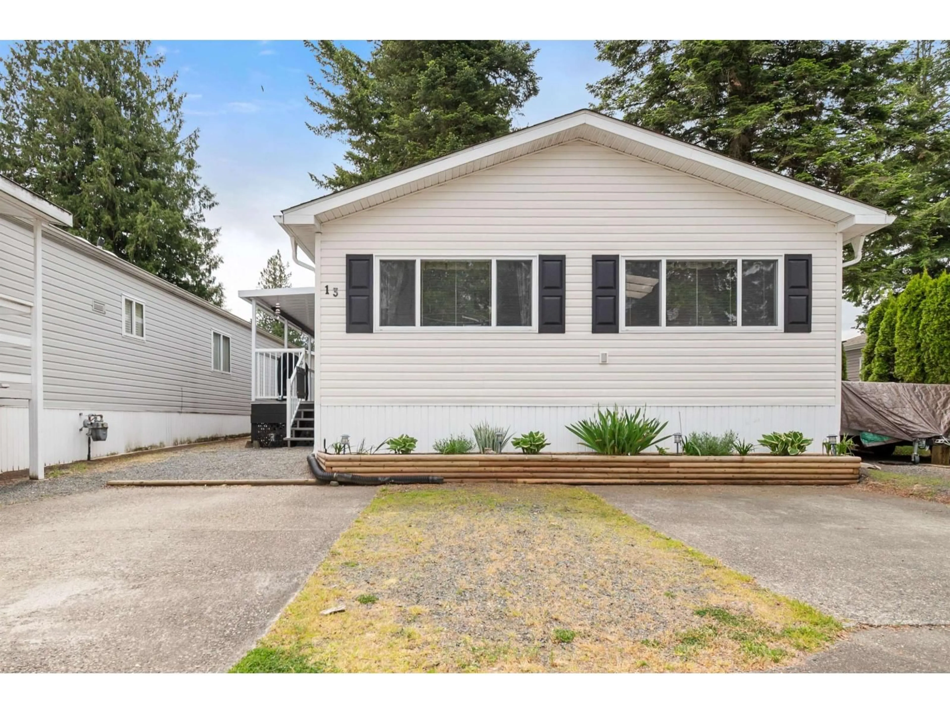 Home with vinyl exterior material, street for 13 - 6338 VEDDER ROAD, Chilliwack British Columbia V2R1C6