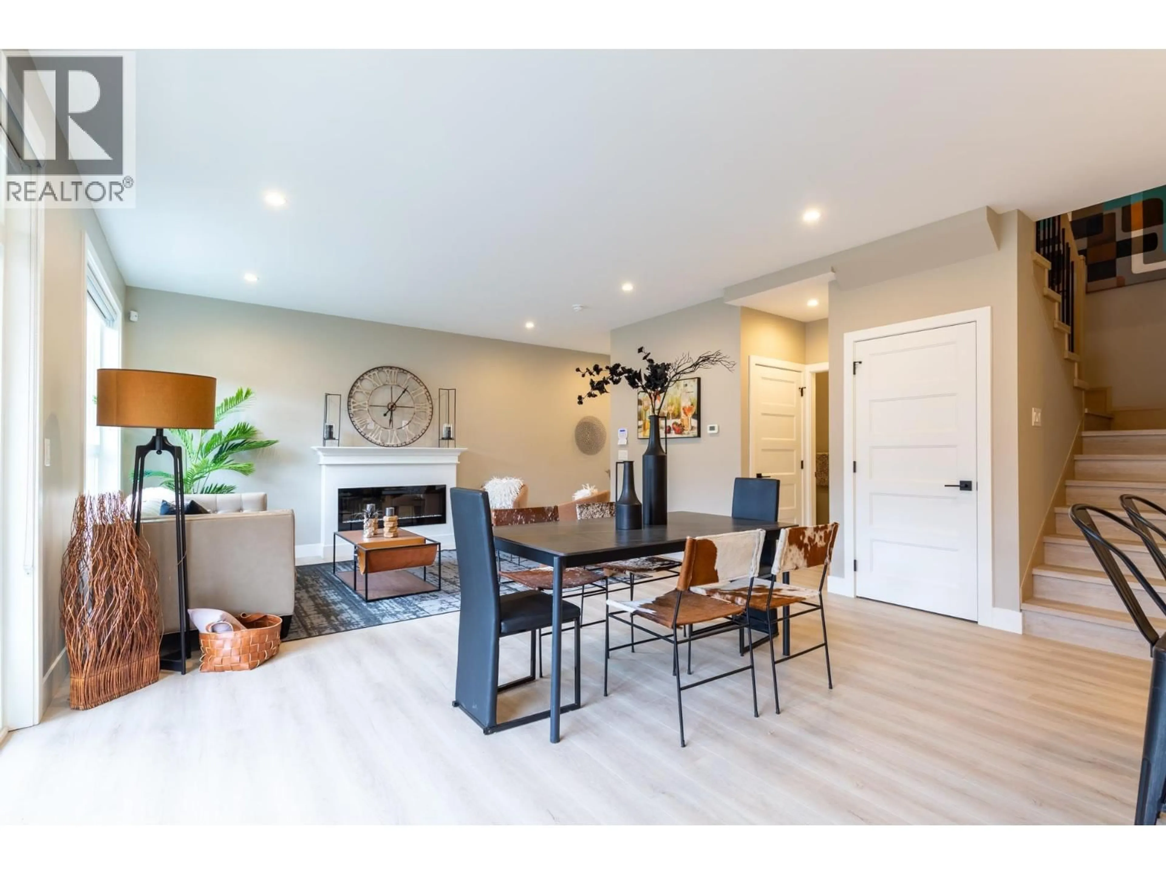 Living room with furniture, wood/laminate floor for 3 - 1211 THOMAS AVENUE, Coquitlam British Columbia V3K2L1