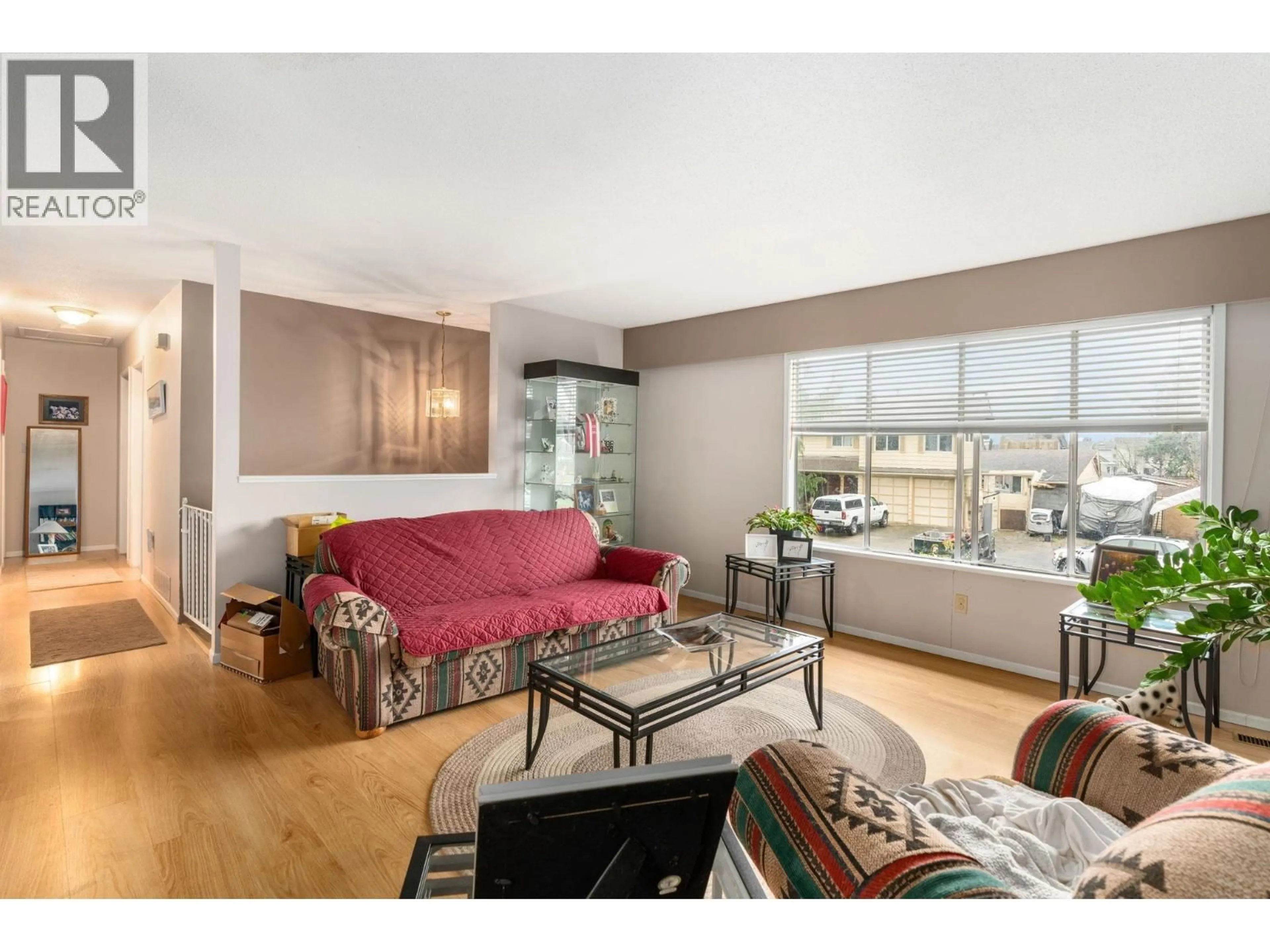 Living room with furniture, wood/laminate floor for 9580 SEACOTE ROAD, Richmond British Columbia V7A4A1