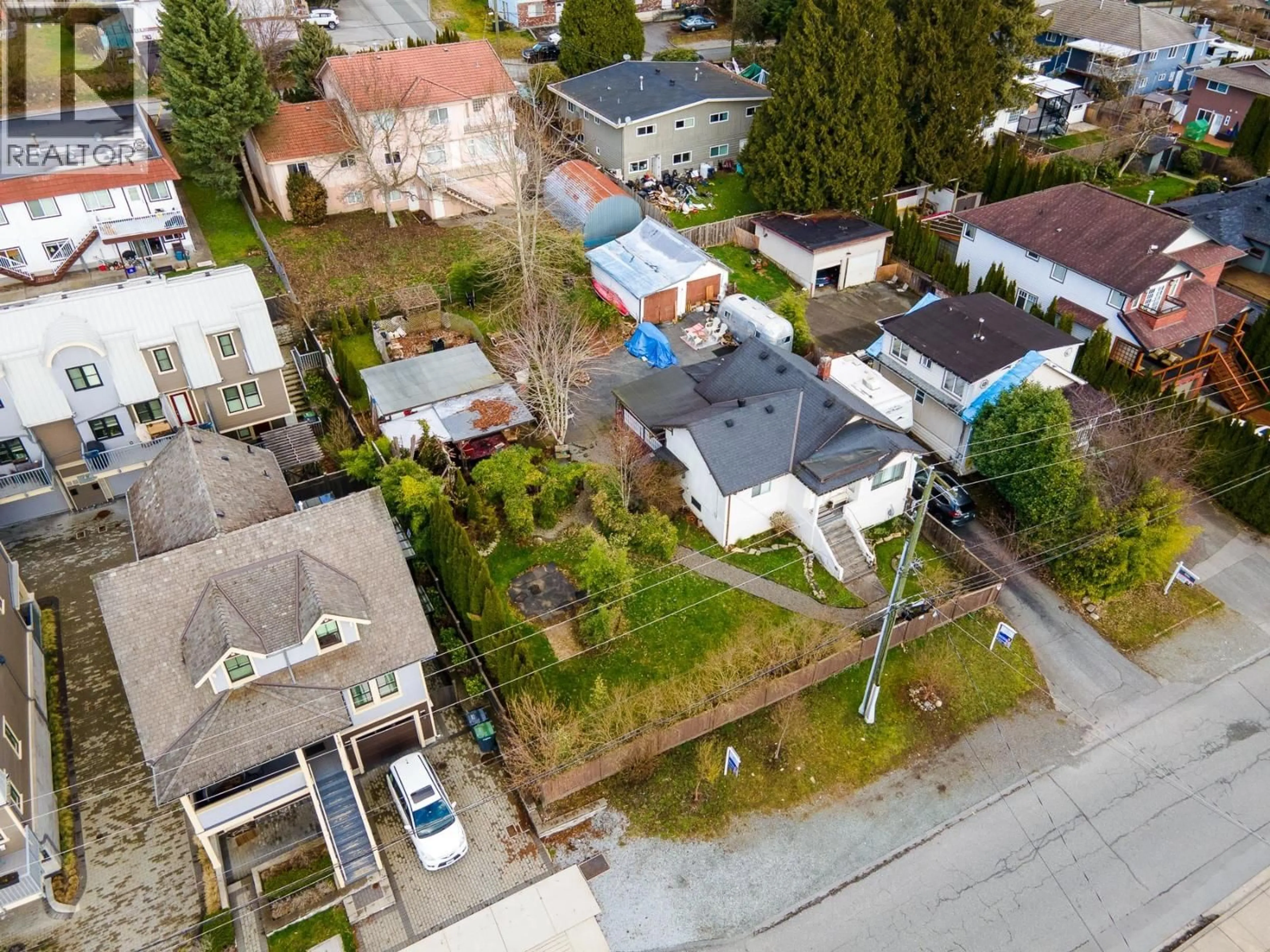 A pic from outside/outdoor area/front of a property/back of a property/a pic from drone, street for 1111 CARTIER AVENUE, Coquitlam British Columbia V3K2C1