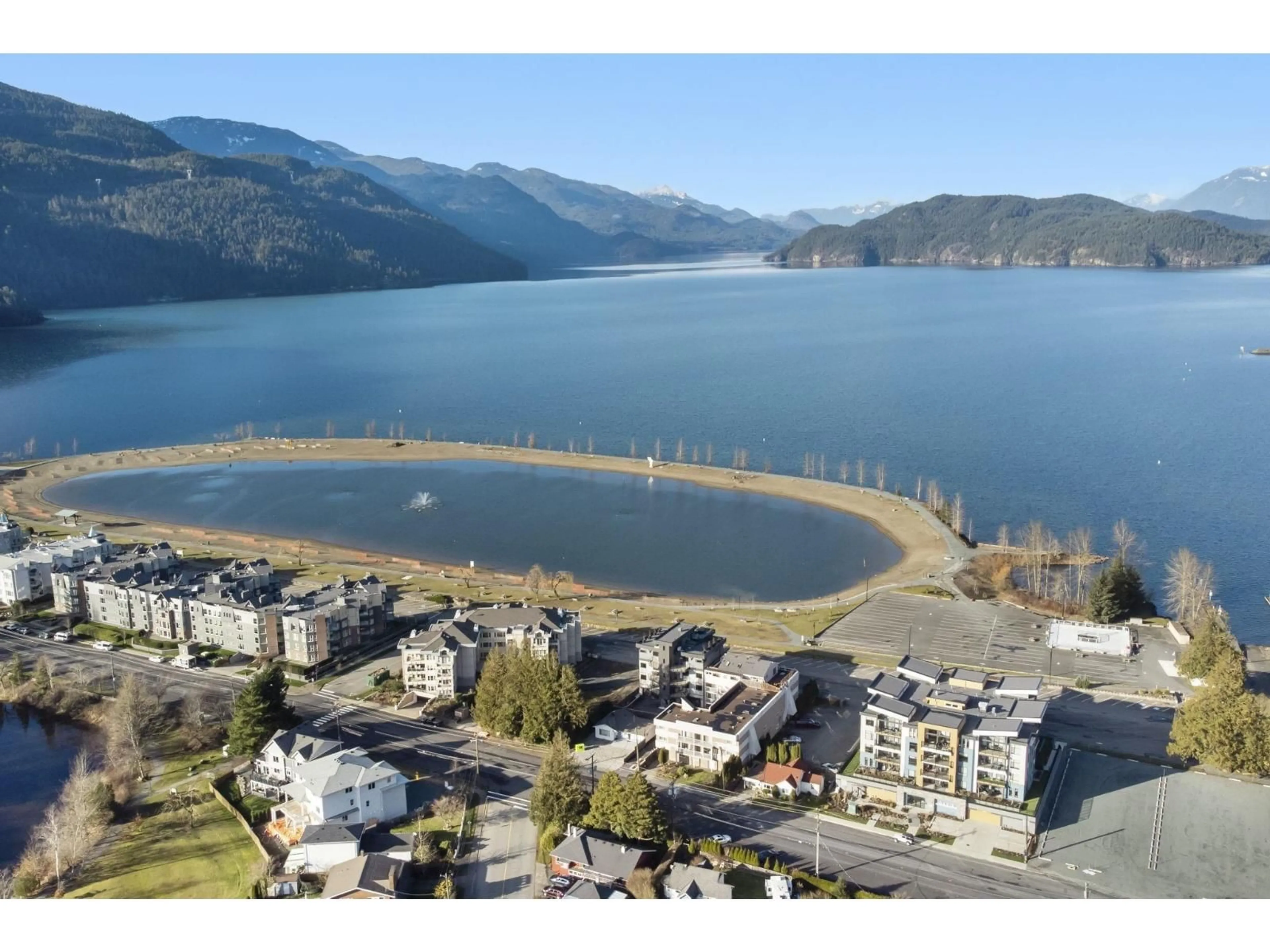 A pic from outside/outdoor area/front of a property/back of a property/a pic from drone, water/lake/river/ocean view for 307 - 470 ESPLANADE AVENUE, Harrison Hot Springs British Columbia V0M1K0