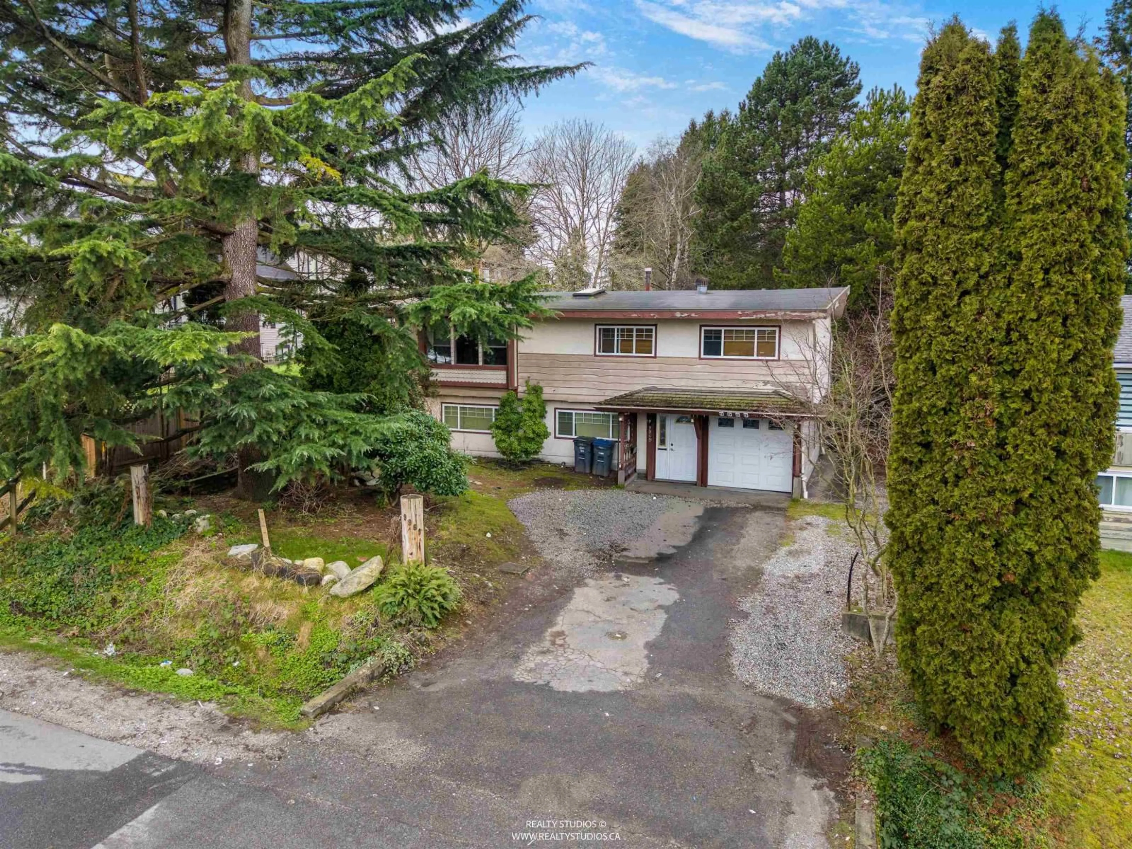 A pic from outside/outdoor area/front of a property/back of a property/a pic from drone, mountain view for 9969 124 STREET, Surrey British Columbia V3V4T2