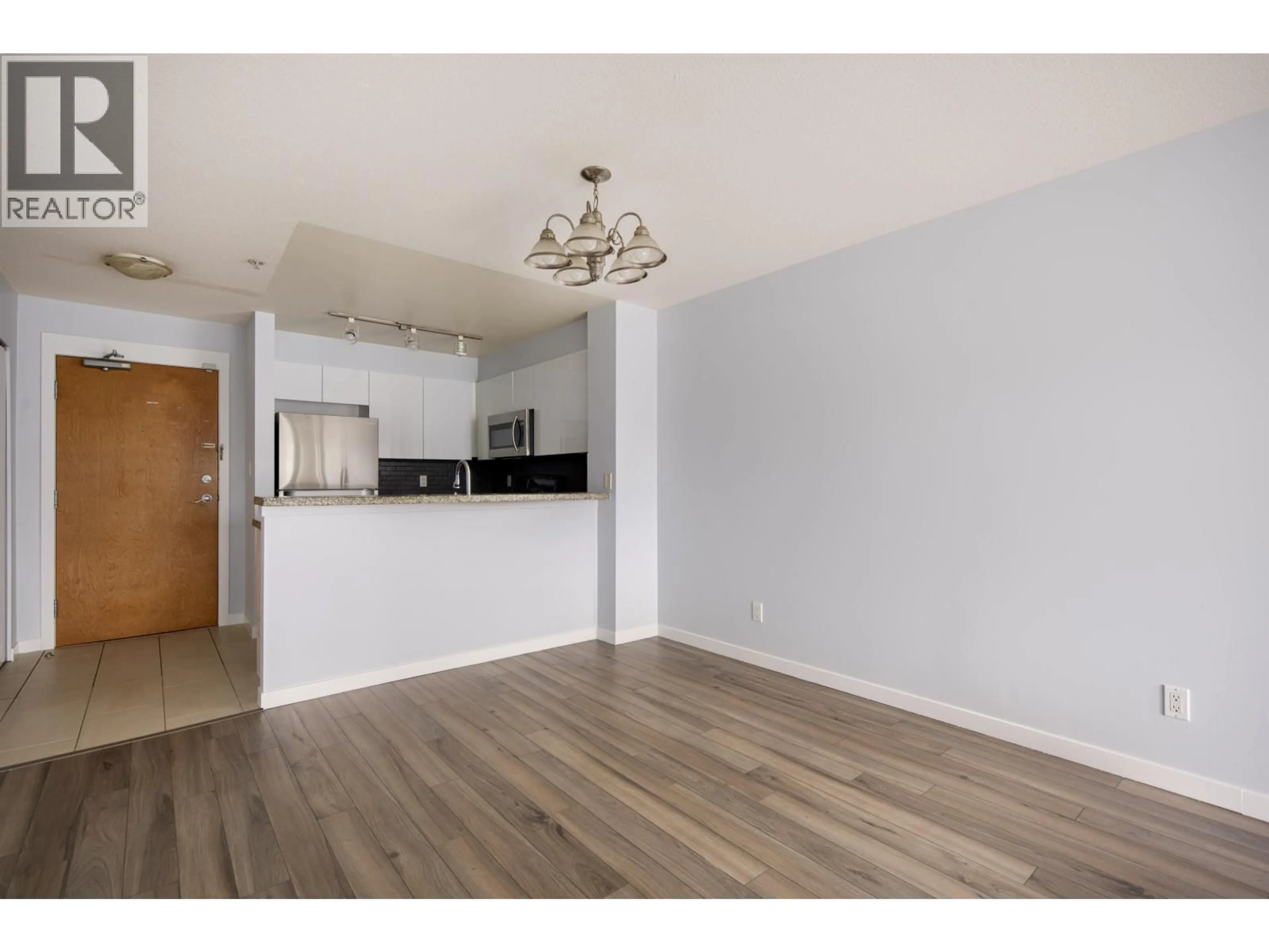 Open concept kitchen, wood/laminate floor for 215 - 8060 JONES ROAD, Richmond British Columbia V6Y4K5