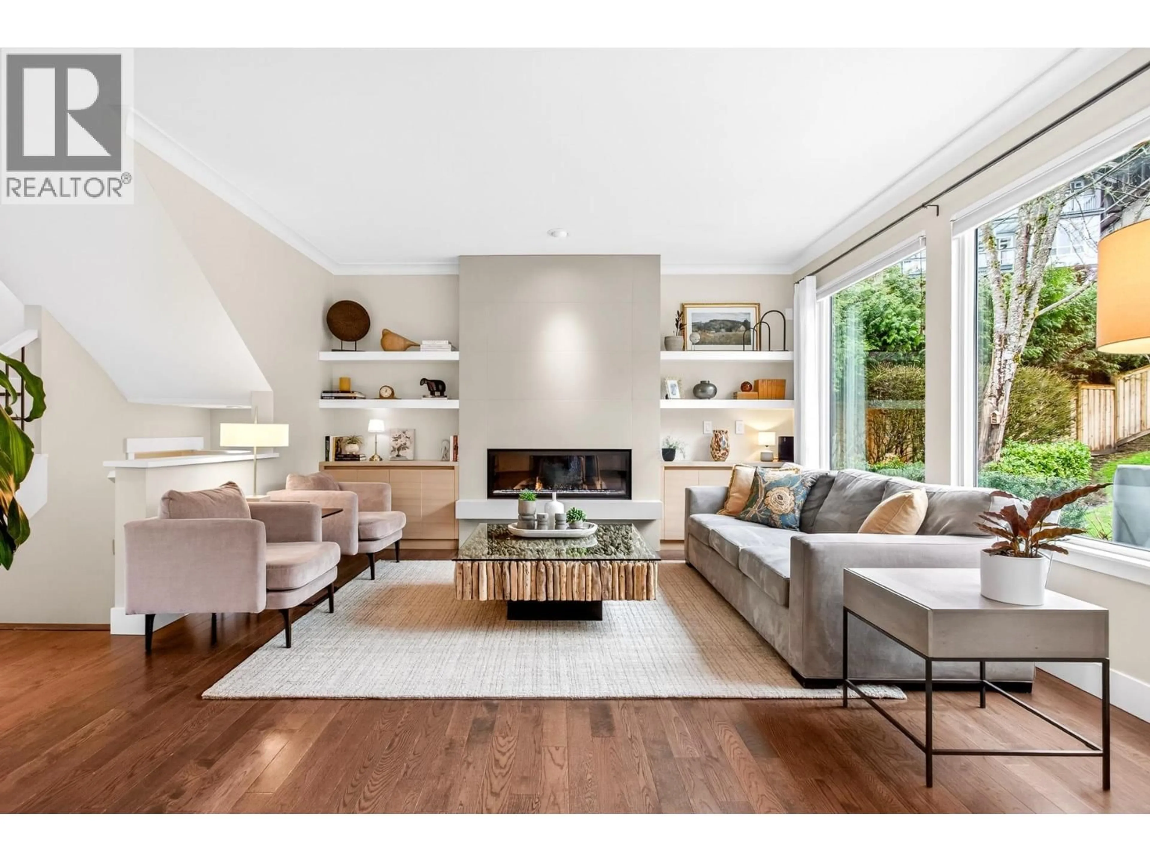 Living room with furniture, wood/laminate floor for 141 GREENLEAF COURT, Port Moody British Columbia V3H5J7