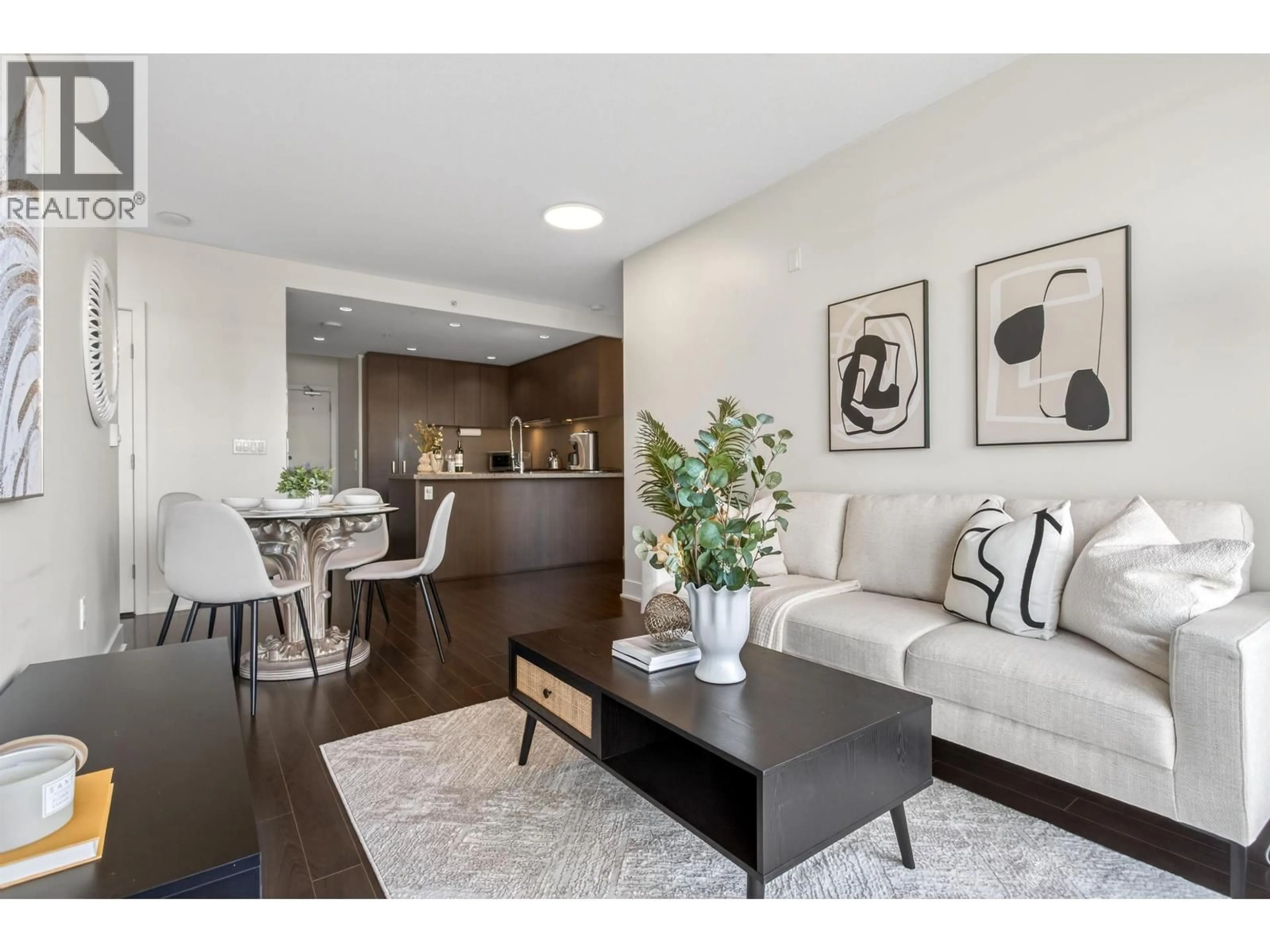 Living room with furniture, wood/laminate floor for 806 - 3008 GLEN DRIVE, Coquitlam British Columbia V3B0J5